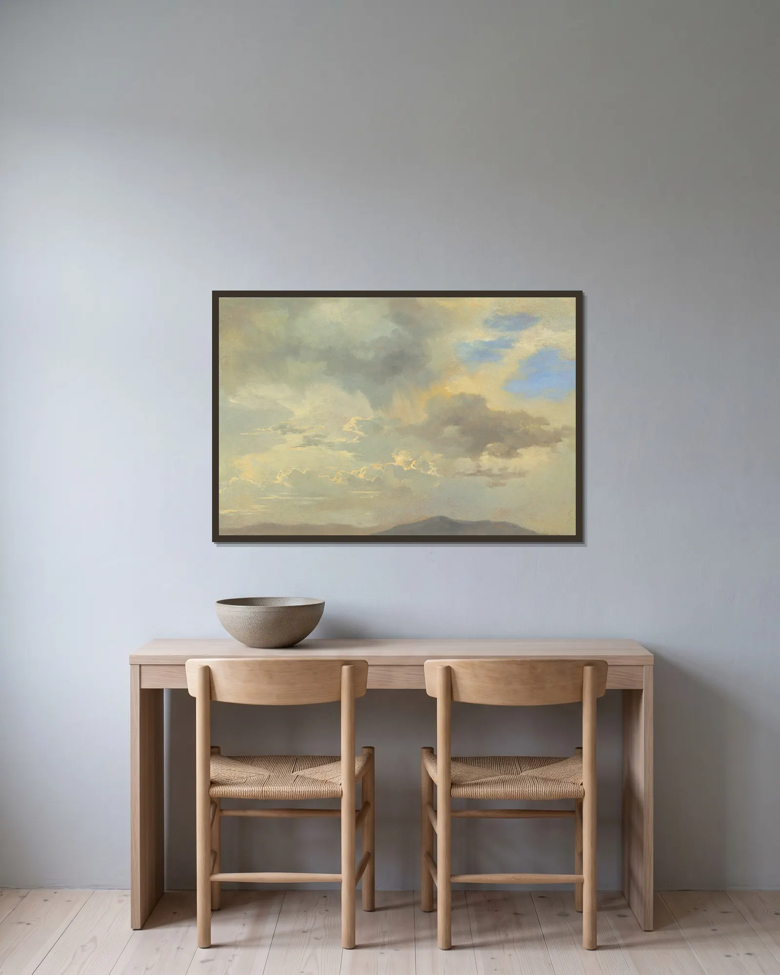 Wolkenstudie av Adalbert Stifter inramad på en vägg