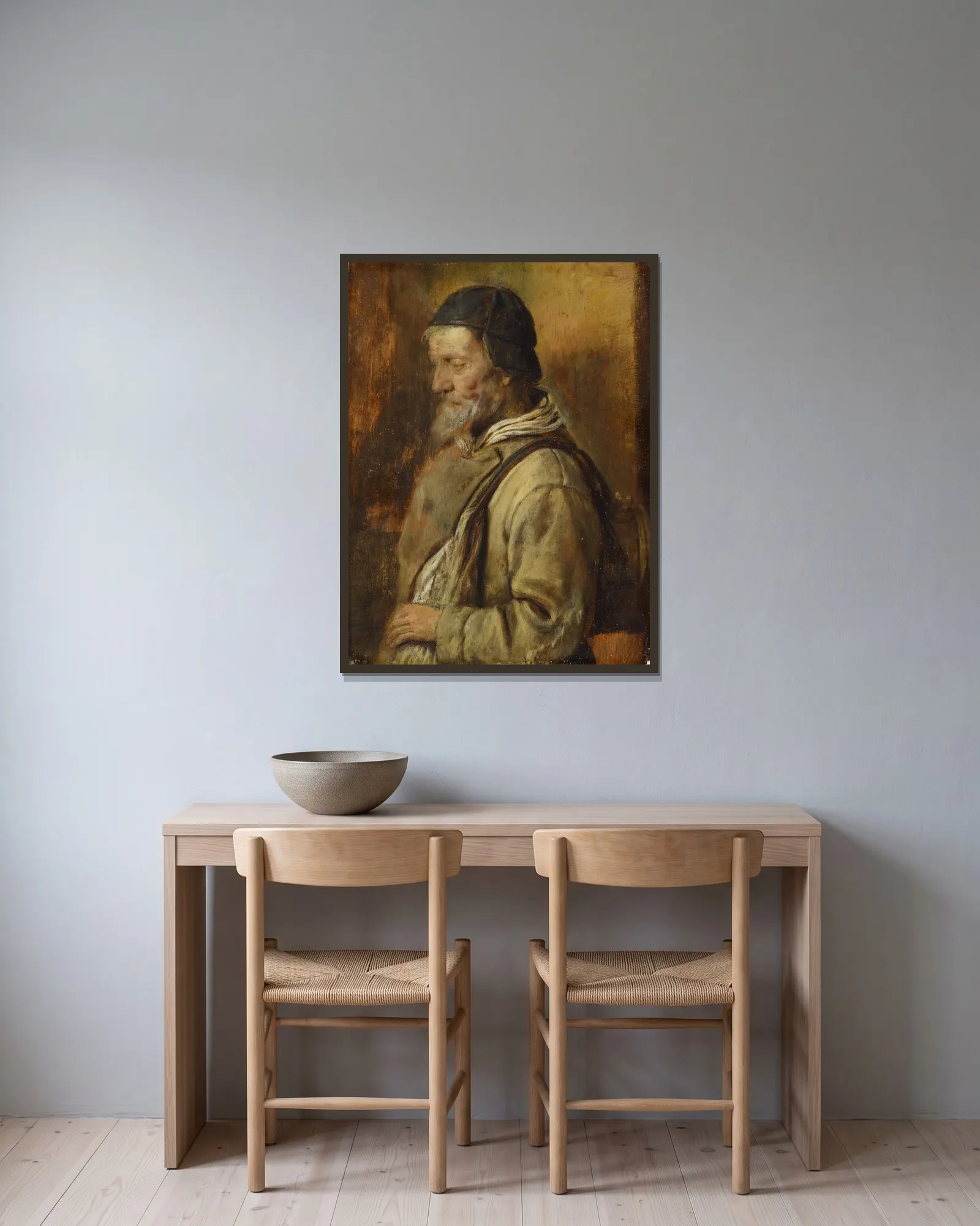 Old Artisan av Adriaen Brouwer inramad på en vägg