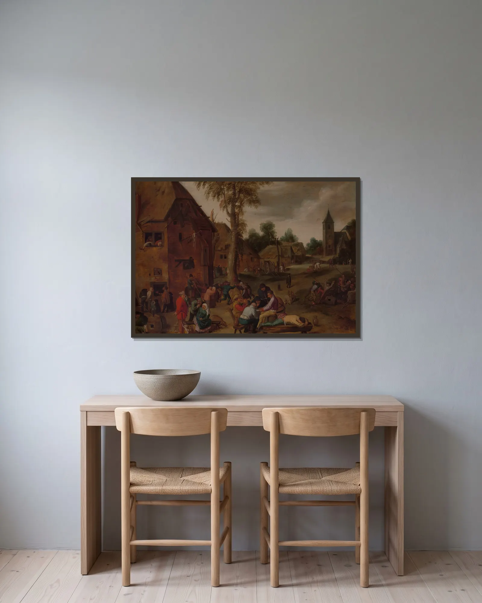 Village Fair av Adriaen Brouwer inramad på en vägg