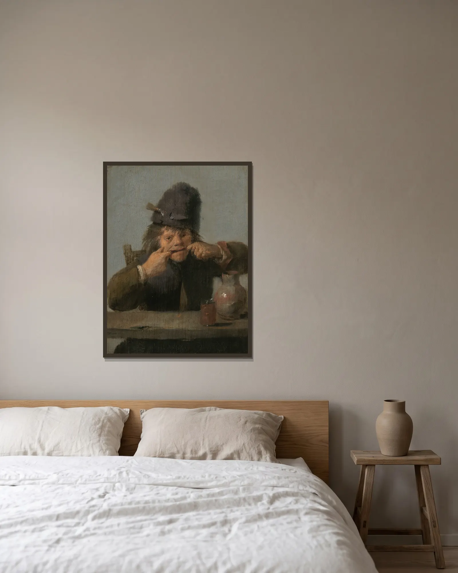 Youth Making a Face av Adriaen Brouwer inramad på en vägg