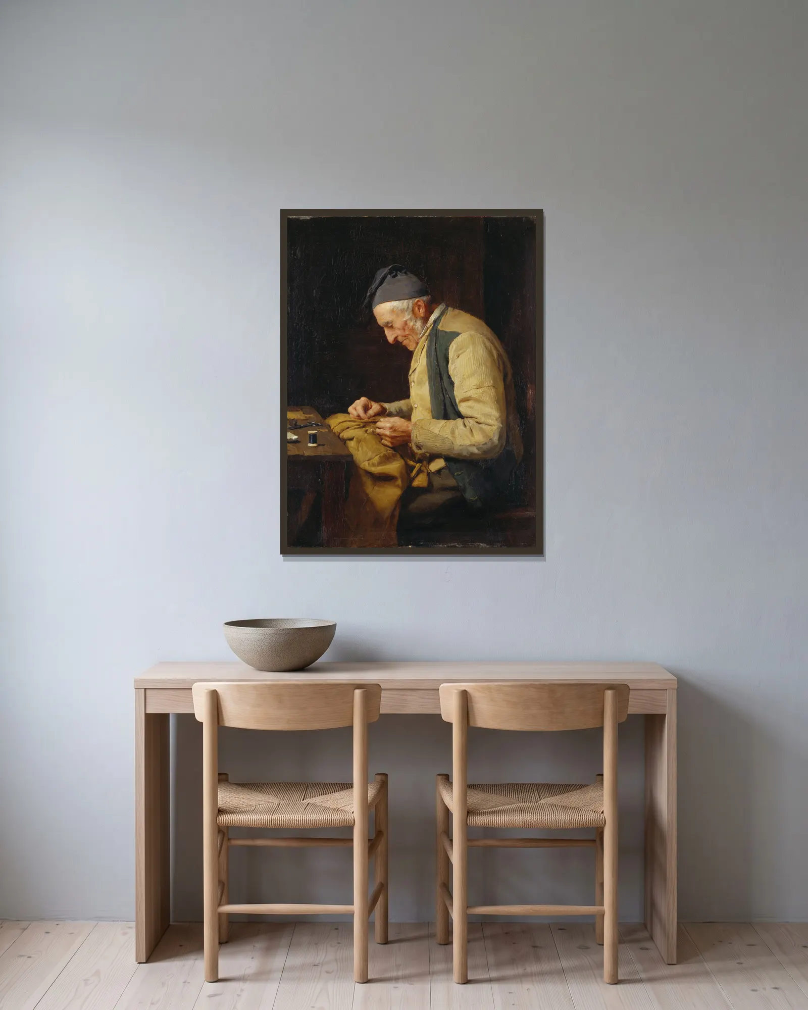 The village tailor av Albert Anker inramad på en vägg