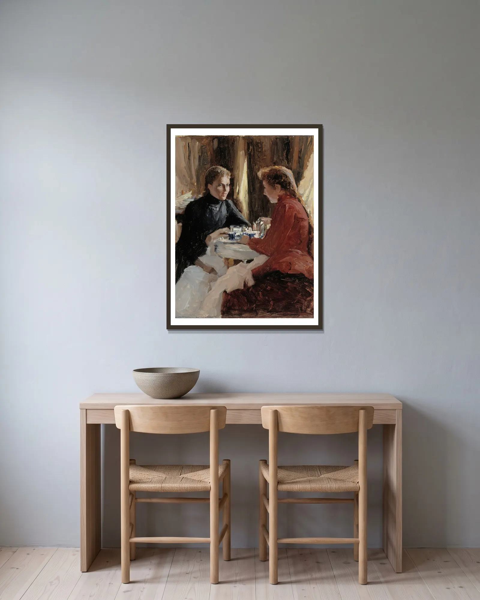 Elevenses av Albert Edelfelt inramad på en vägg