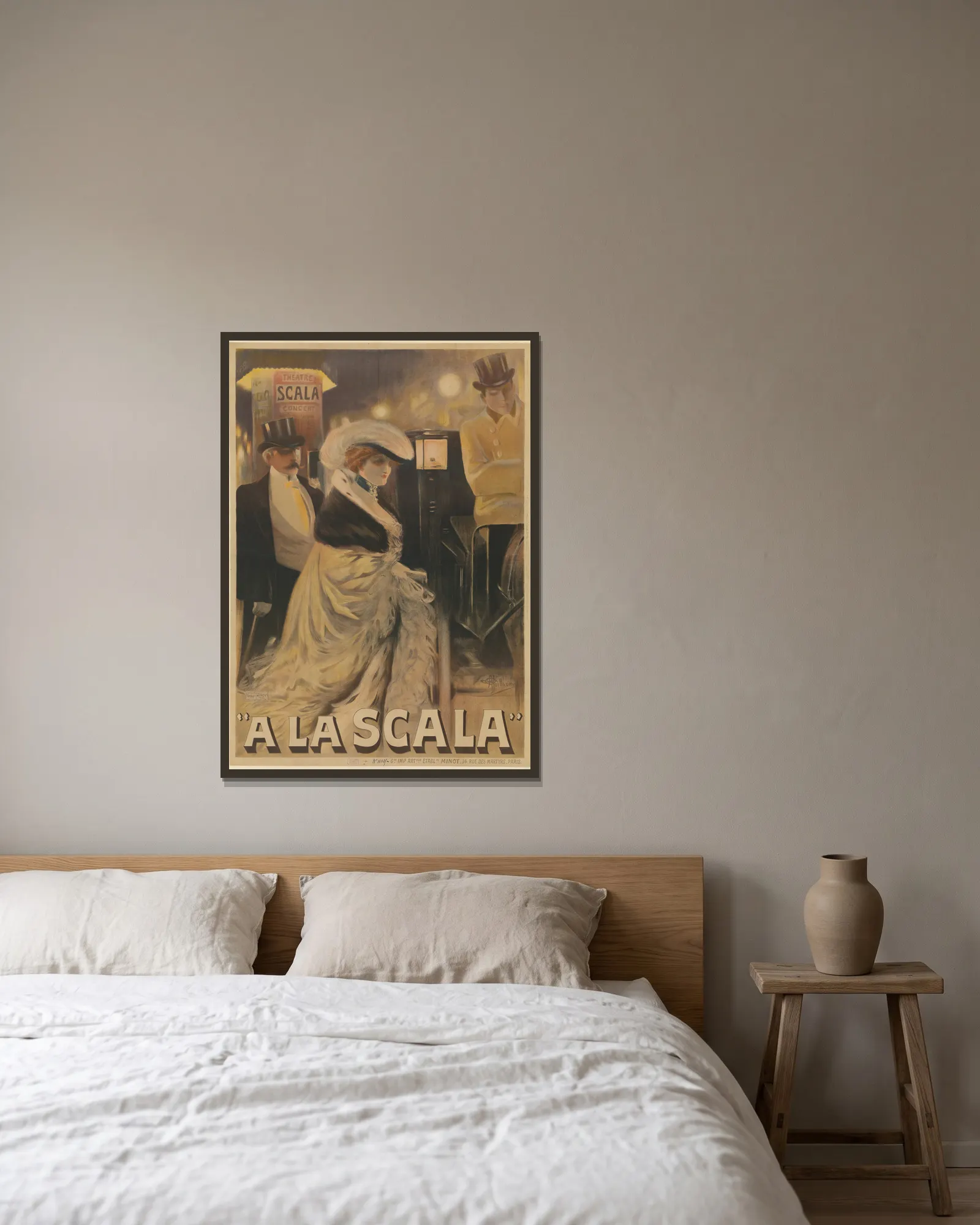 A la Scala av Albert Guillaume inramad på en vägg
