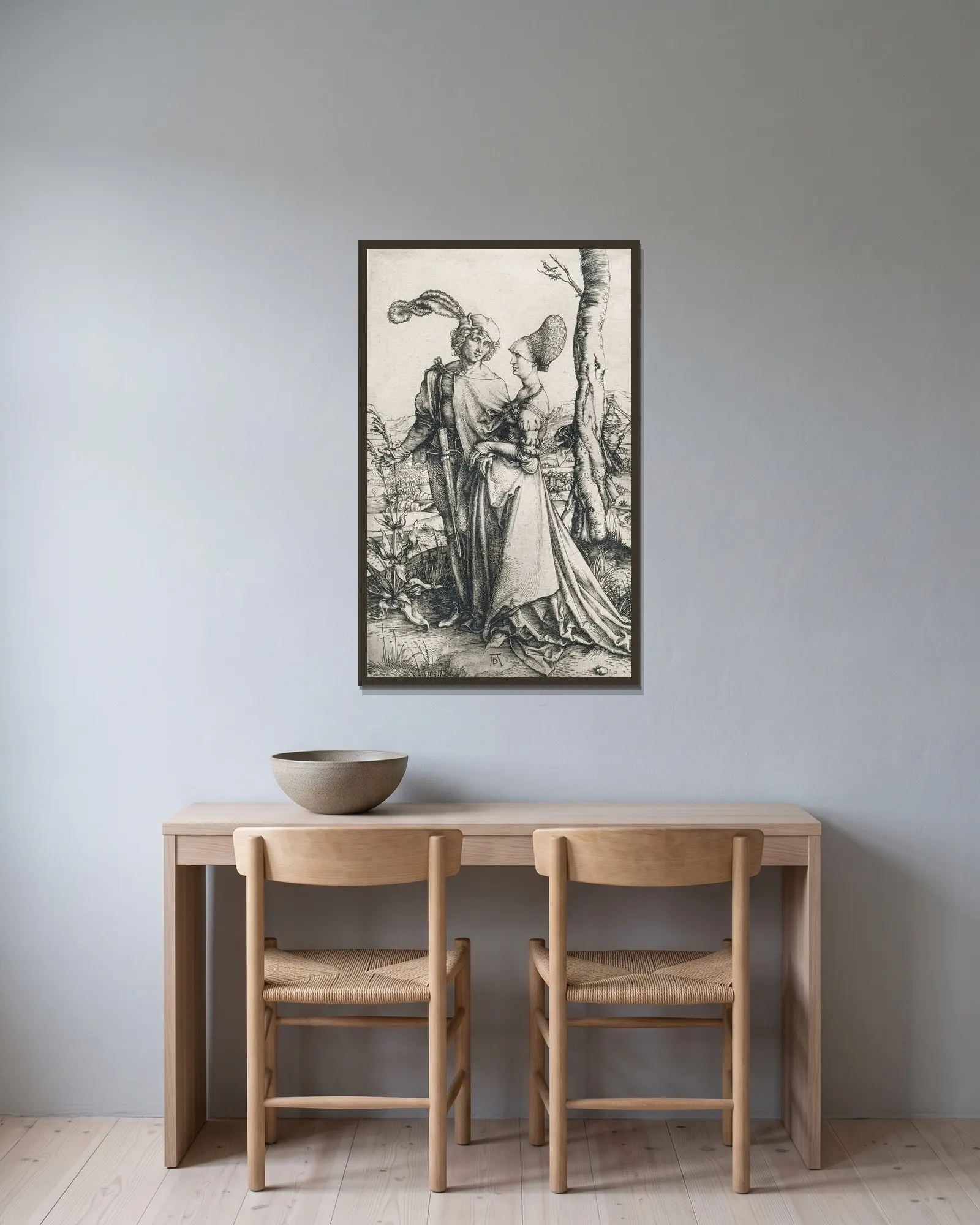 Death and the Lovers av Albrecht Dürer inramad på en vägg