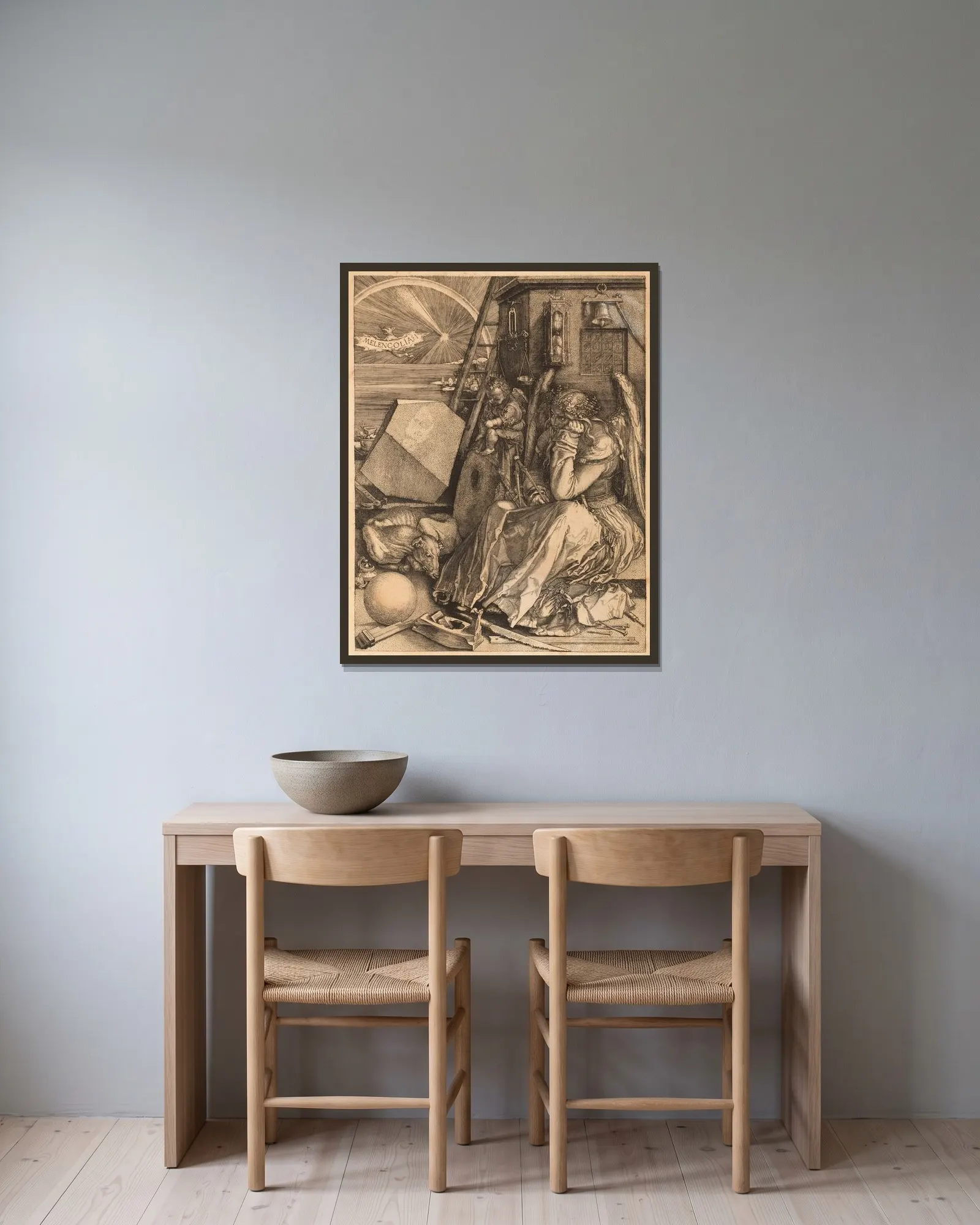 Melancholy av Albrecht Dürer inramad på en vägg