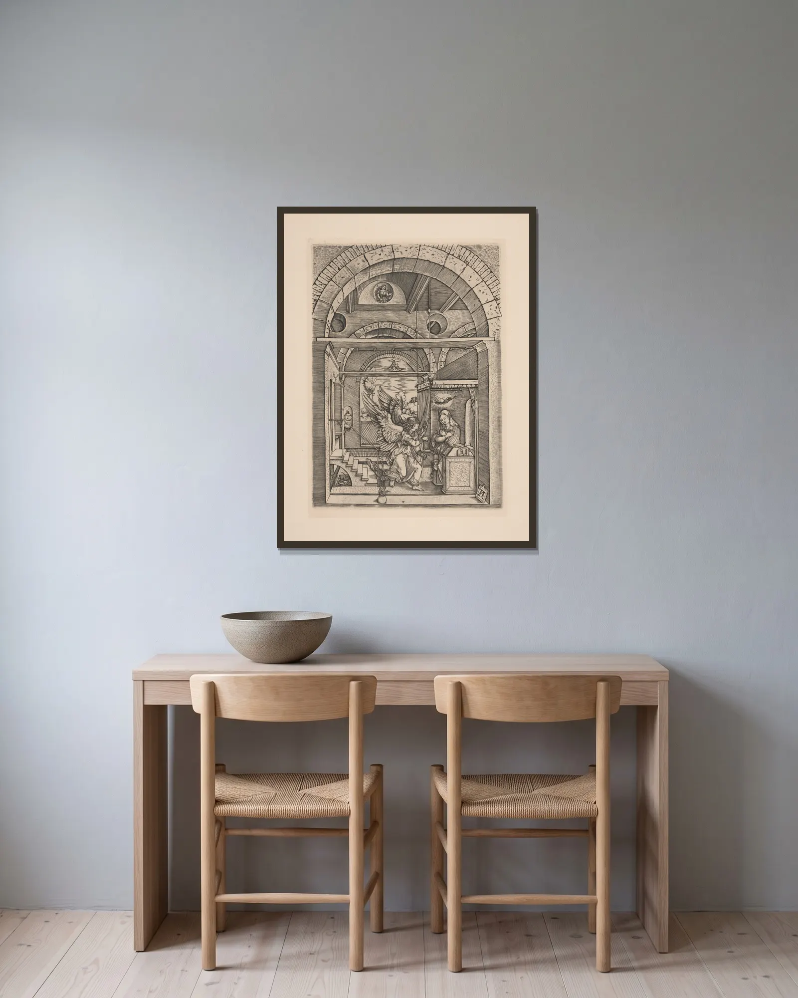 The Annunciation av Albrecht Dürer inramad på en vägg
