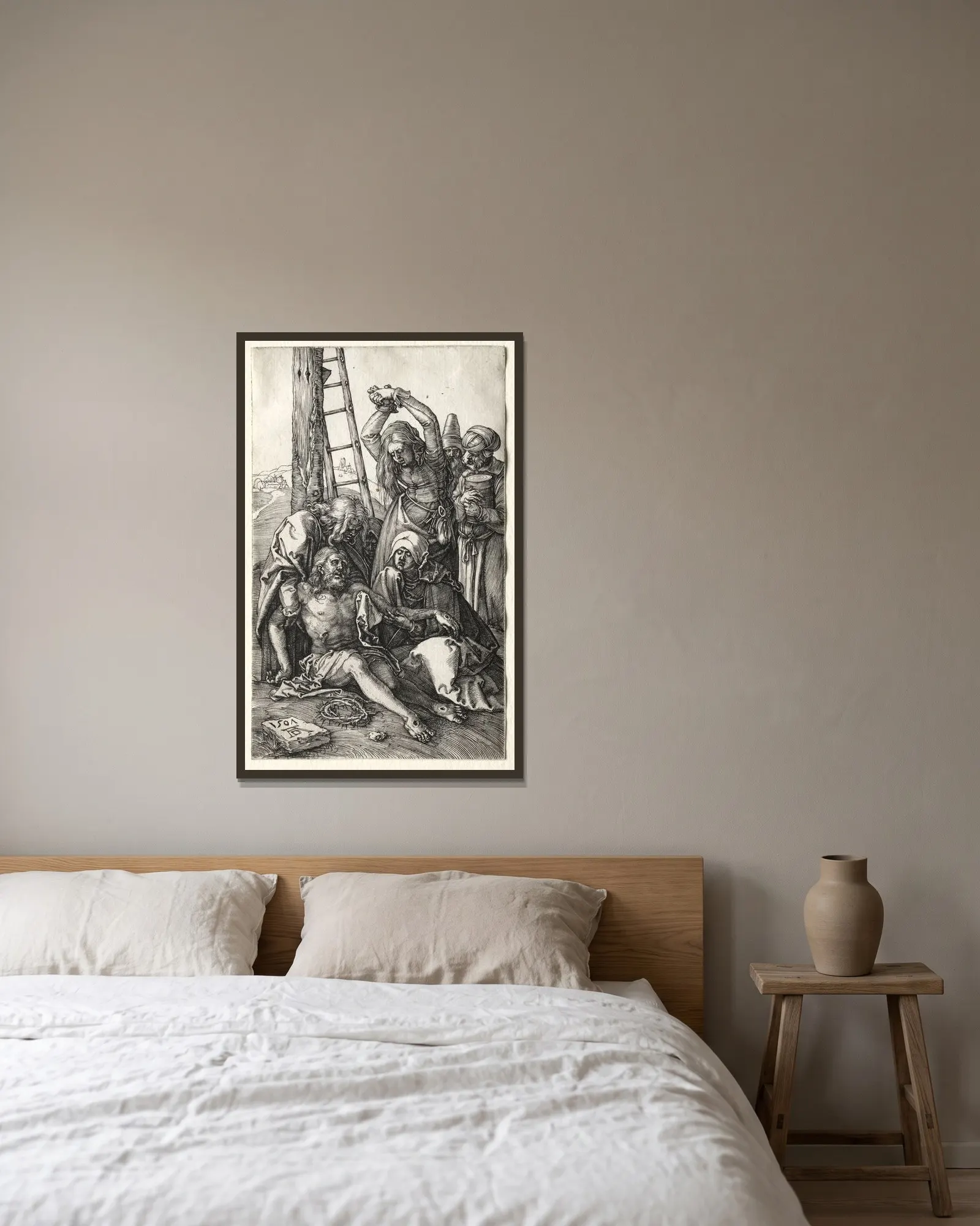 The Lamentation av Albrecht Dürer inramad på en vägg