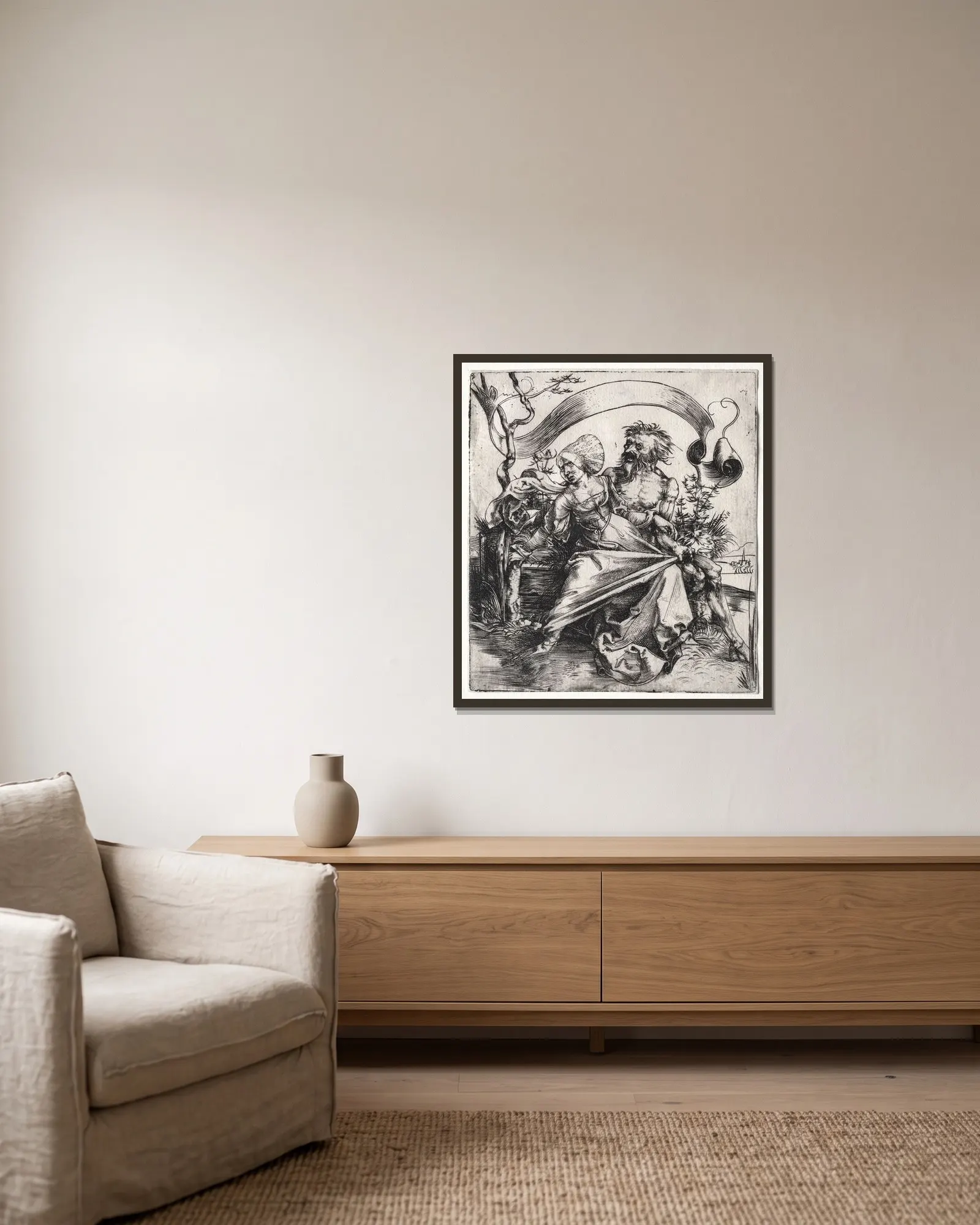 The Ravisher av Albrecht Dürer inramad på en vägg