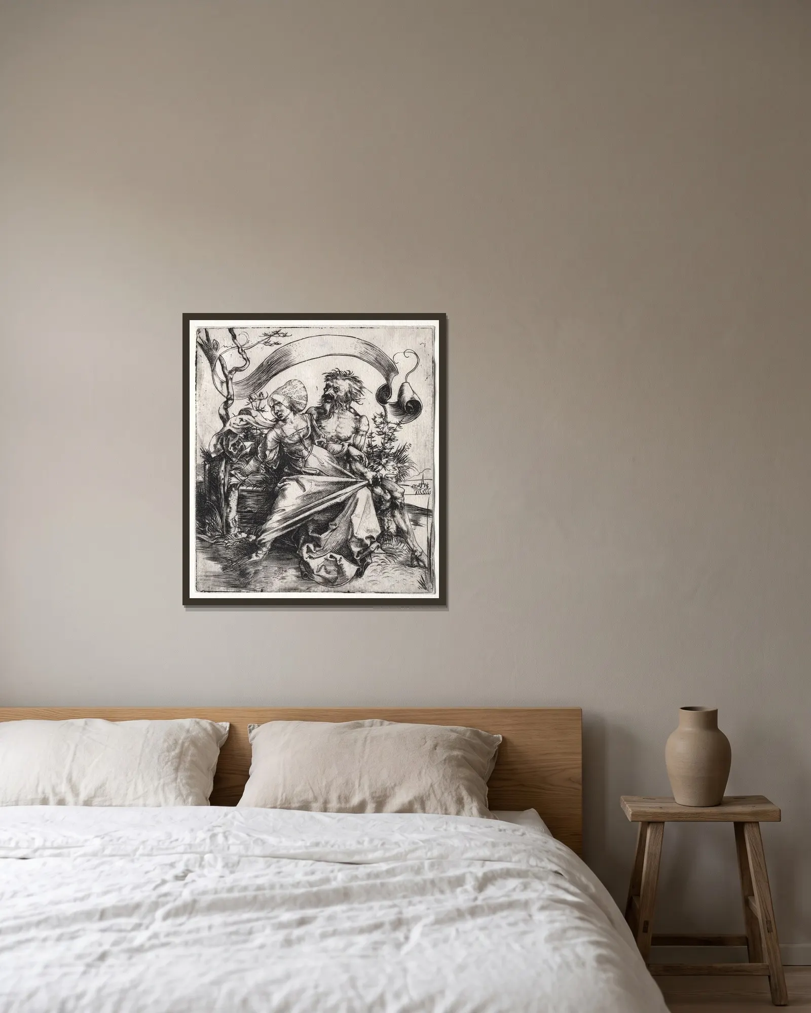 The Ravisher av Albrecht Dürer inramad på en vägg