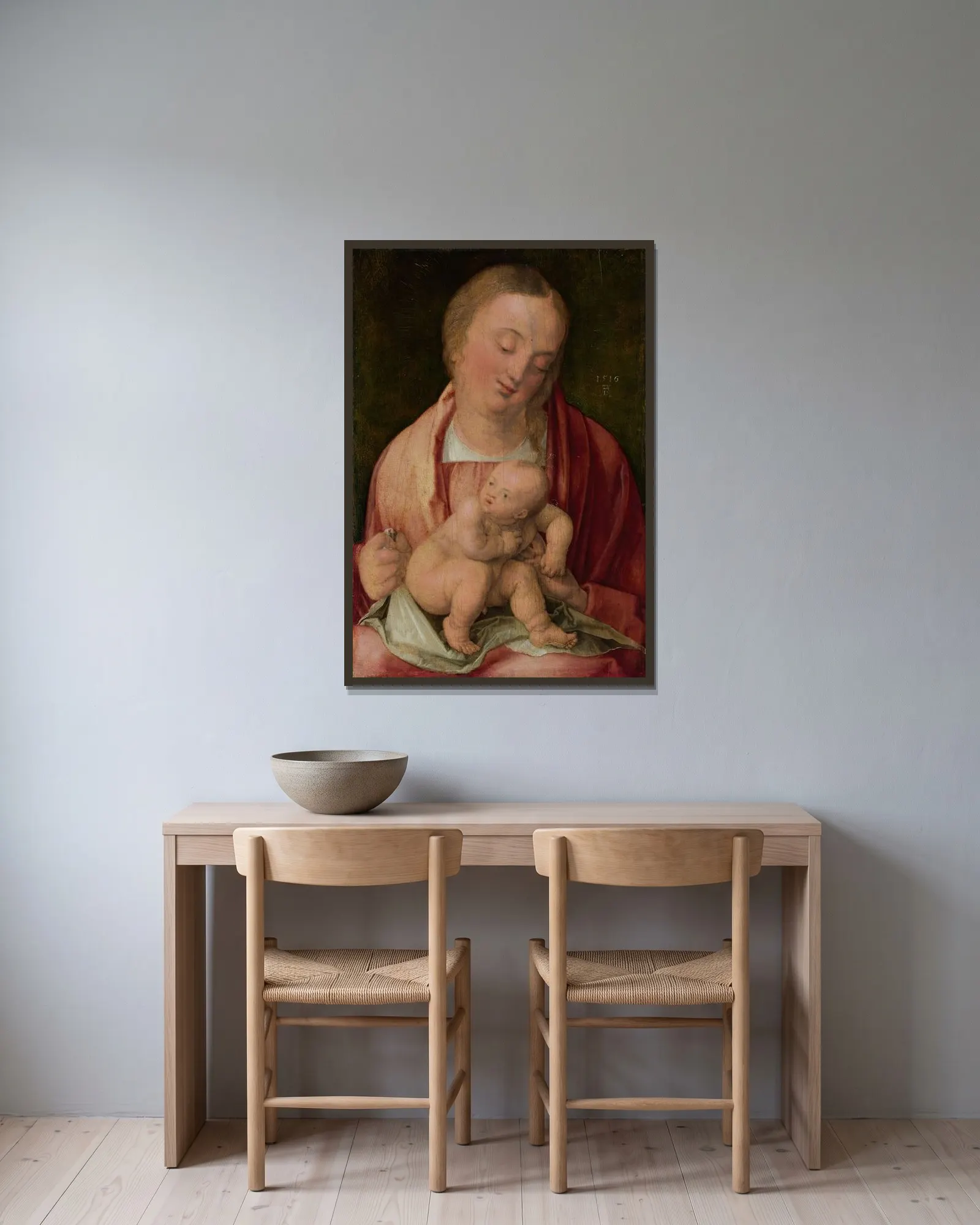 Virgin and Child av Albrecht Dürer inramad på en vägg