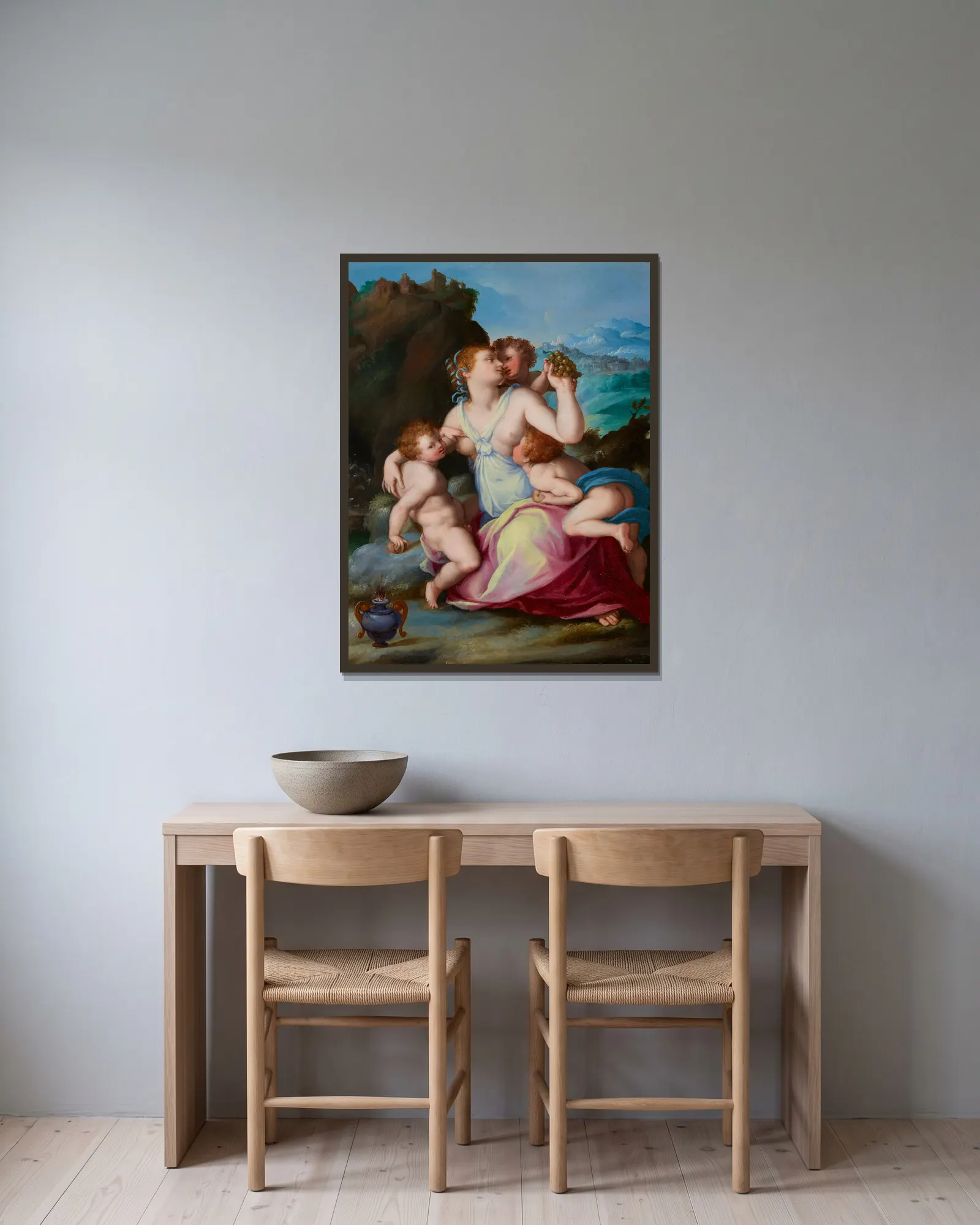 Charity av Alessandro Allori inramad på en vägg