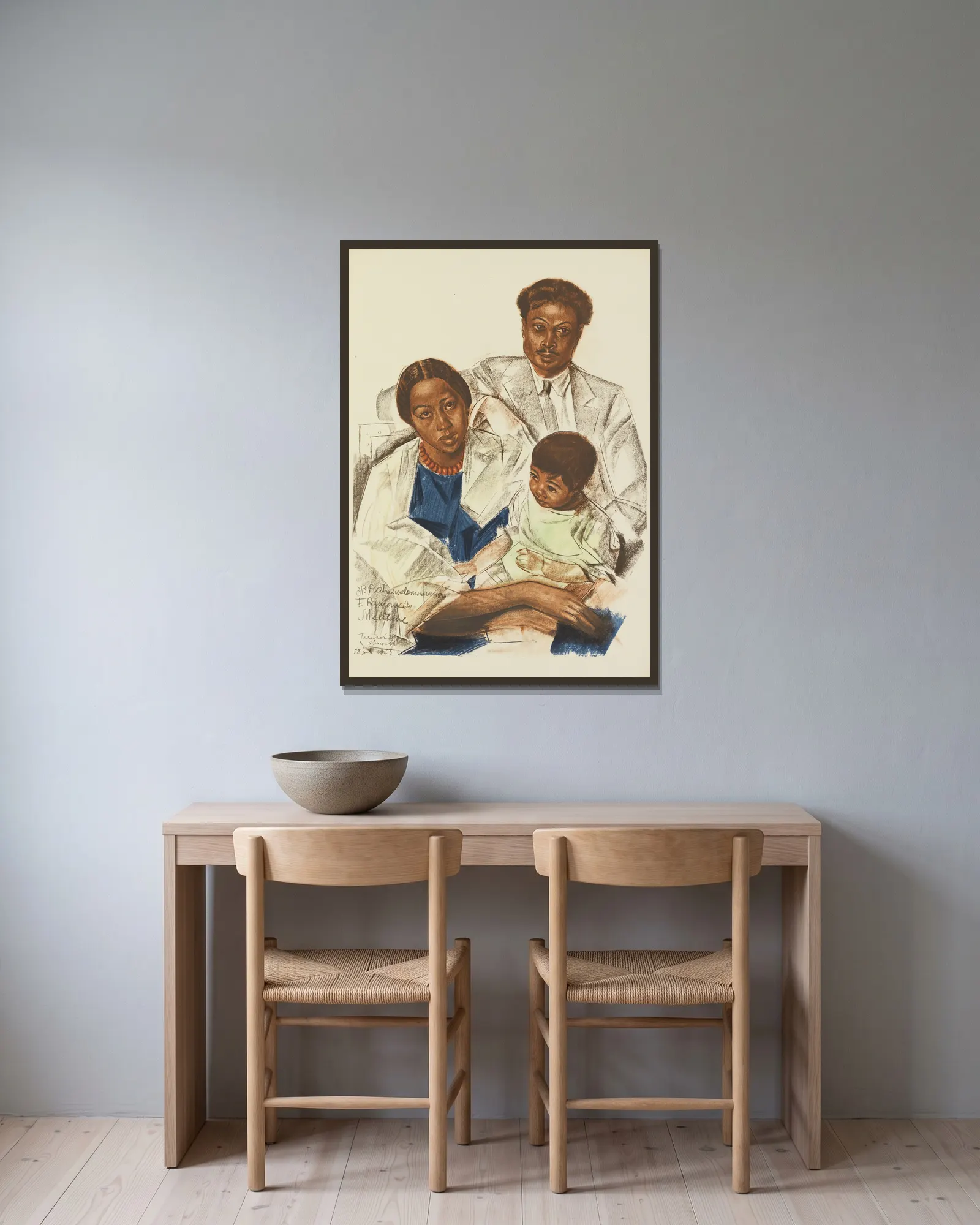 Famille Malgache (Tananarive) av Alexandre Jacovleff inramad på en vägg