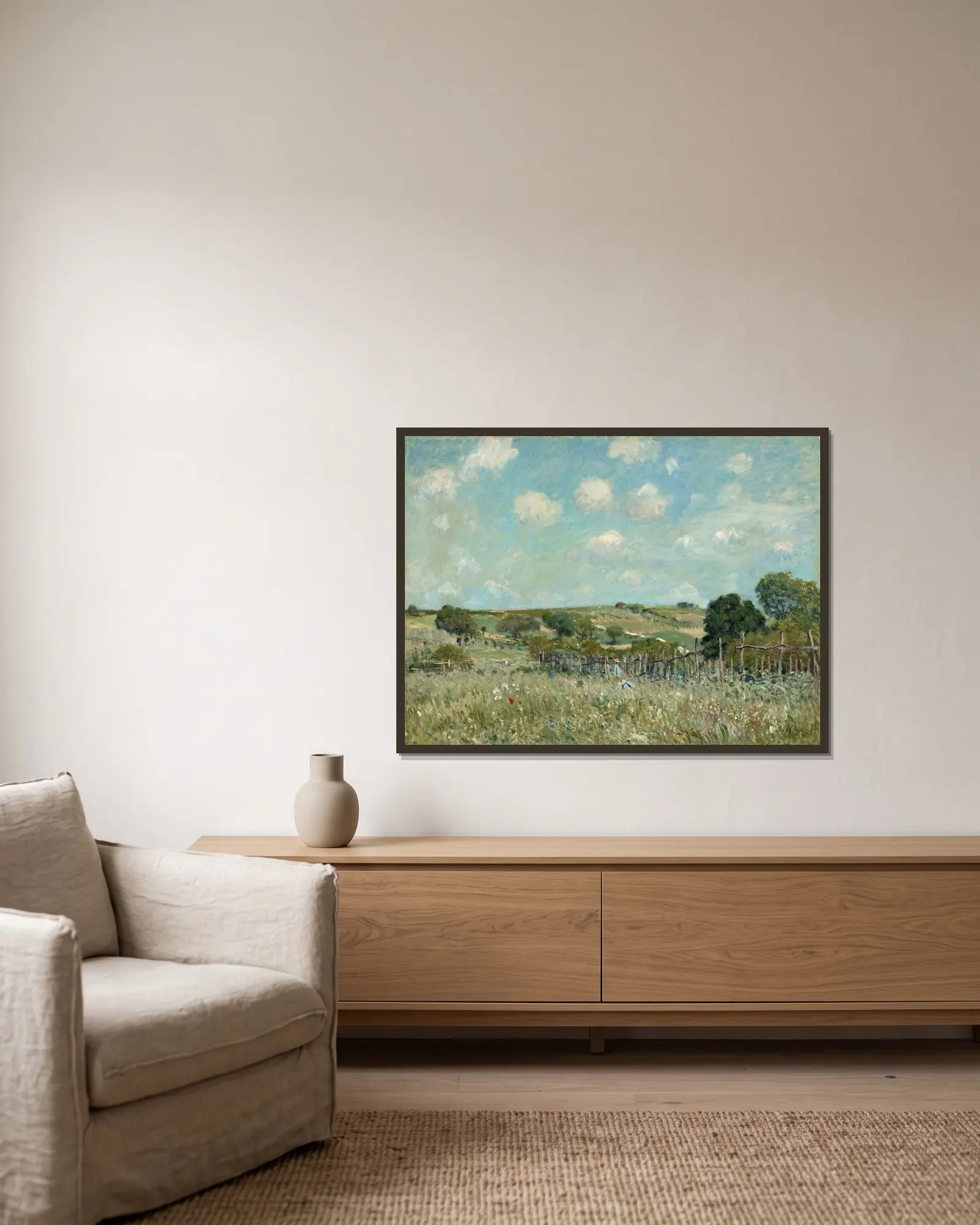 Meadow av Alfred Sisley inramad på en vägg