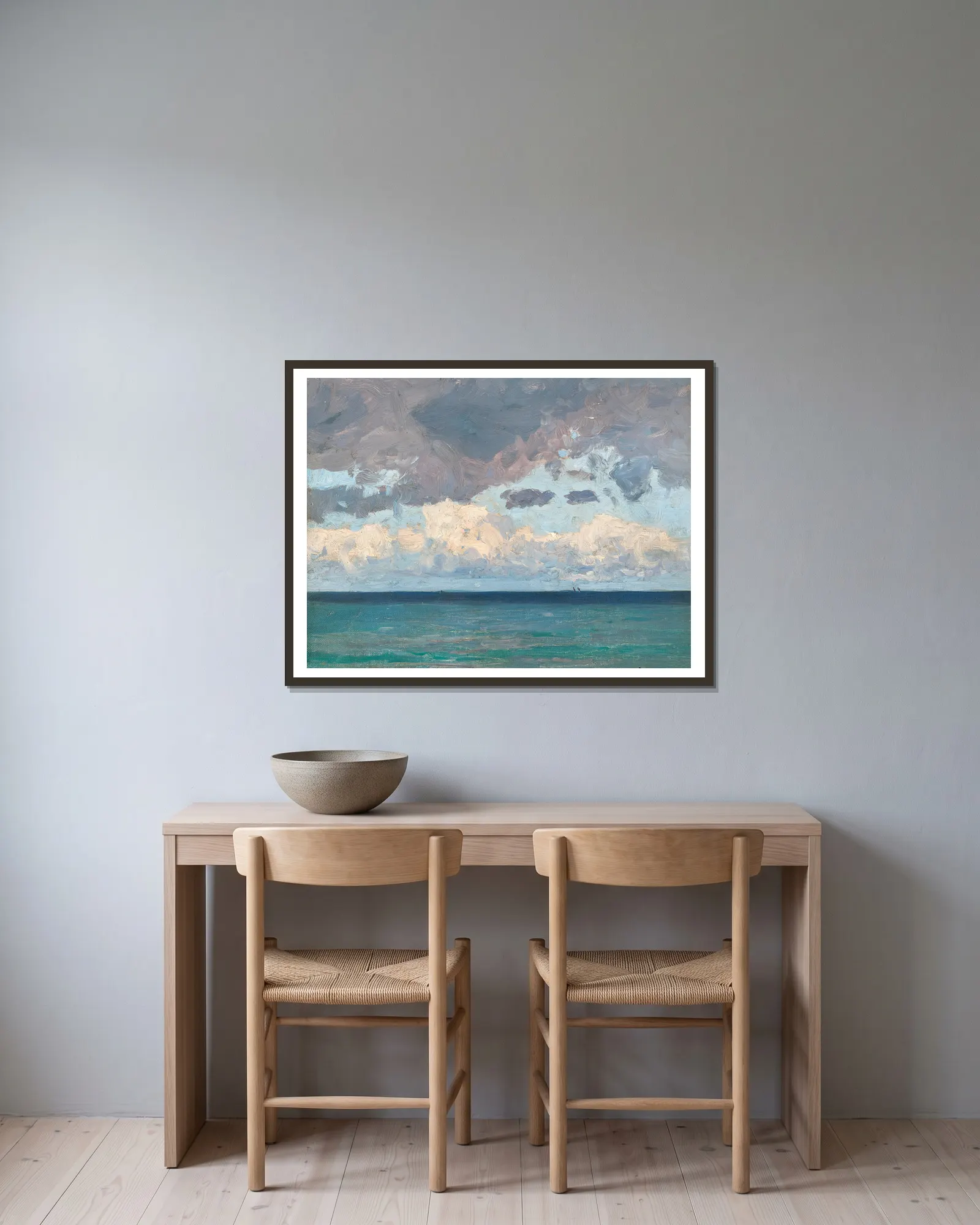 Clouds over the sea av Alfred Zoff inramad på en vägg