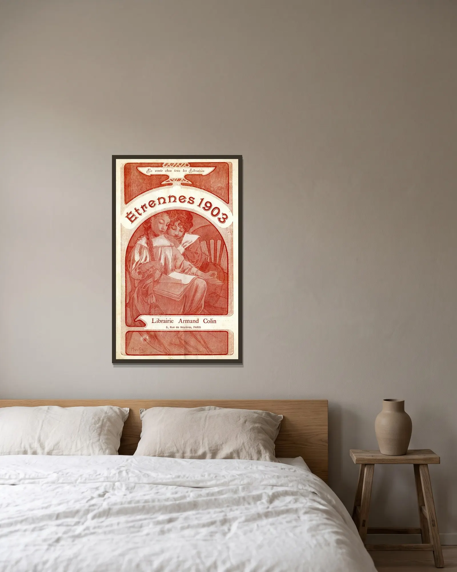 Etrennes av Alphonse Mucha inramad på en vägg