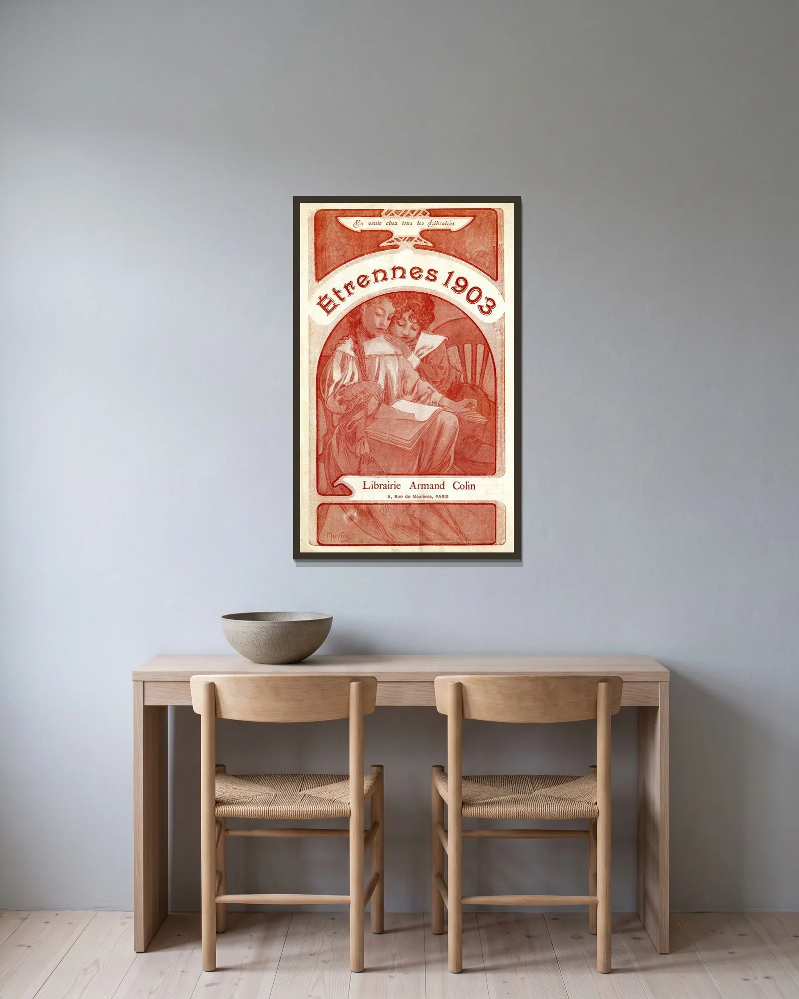 Etrennes av Alphonse Mucha inramad på en vägg