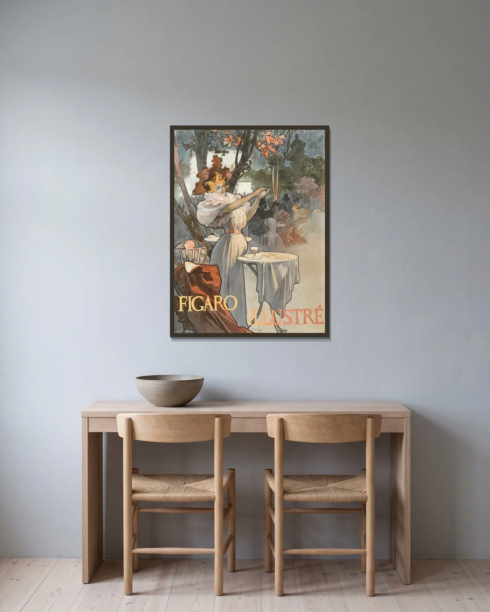 Figaro av Alphonse Mucha inramad på en vägg
