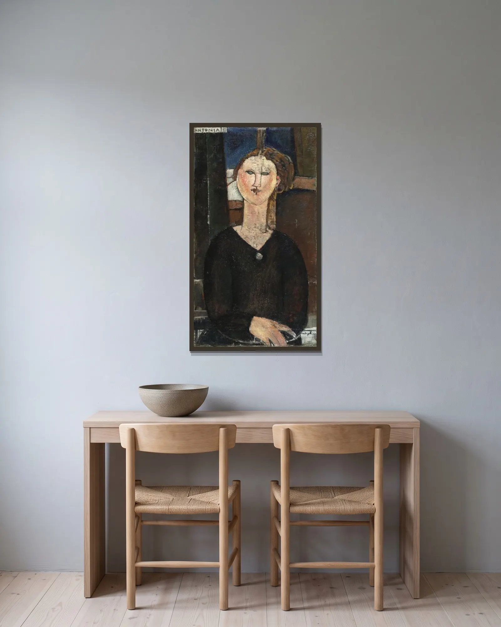 Antonia av Amedeo Modigliani inramad på en vägg