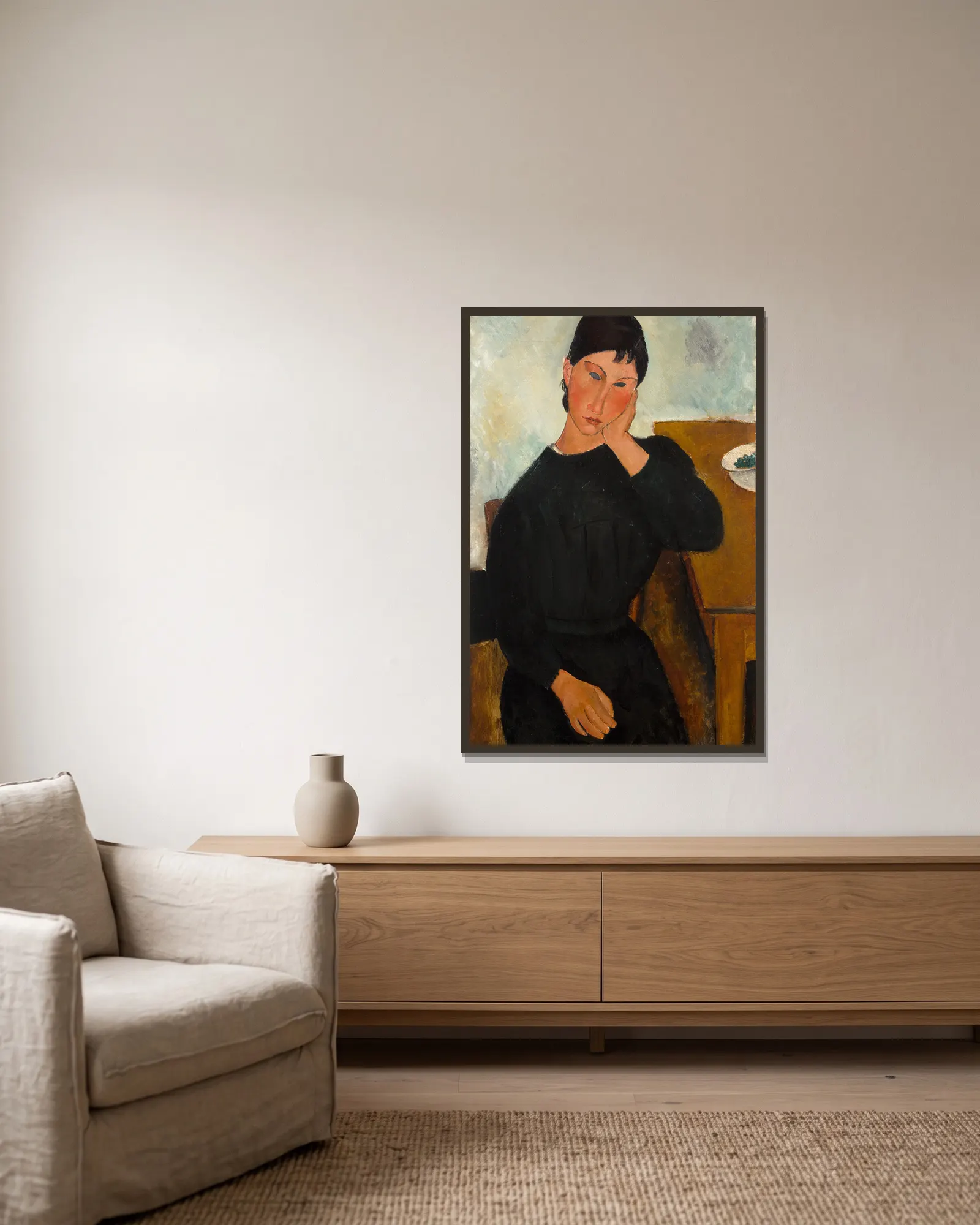 Elvira Resting at a Table av Amedeo Modigliani inramad på en vägg