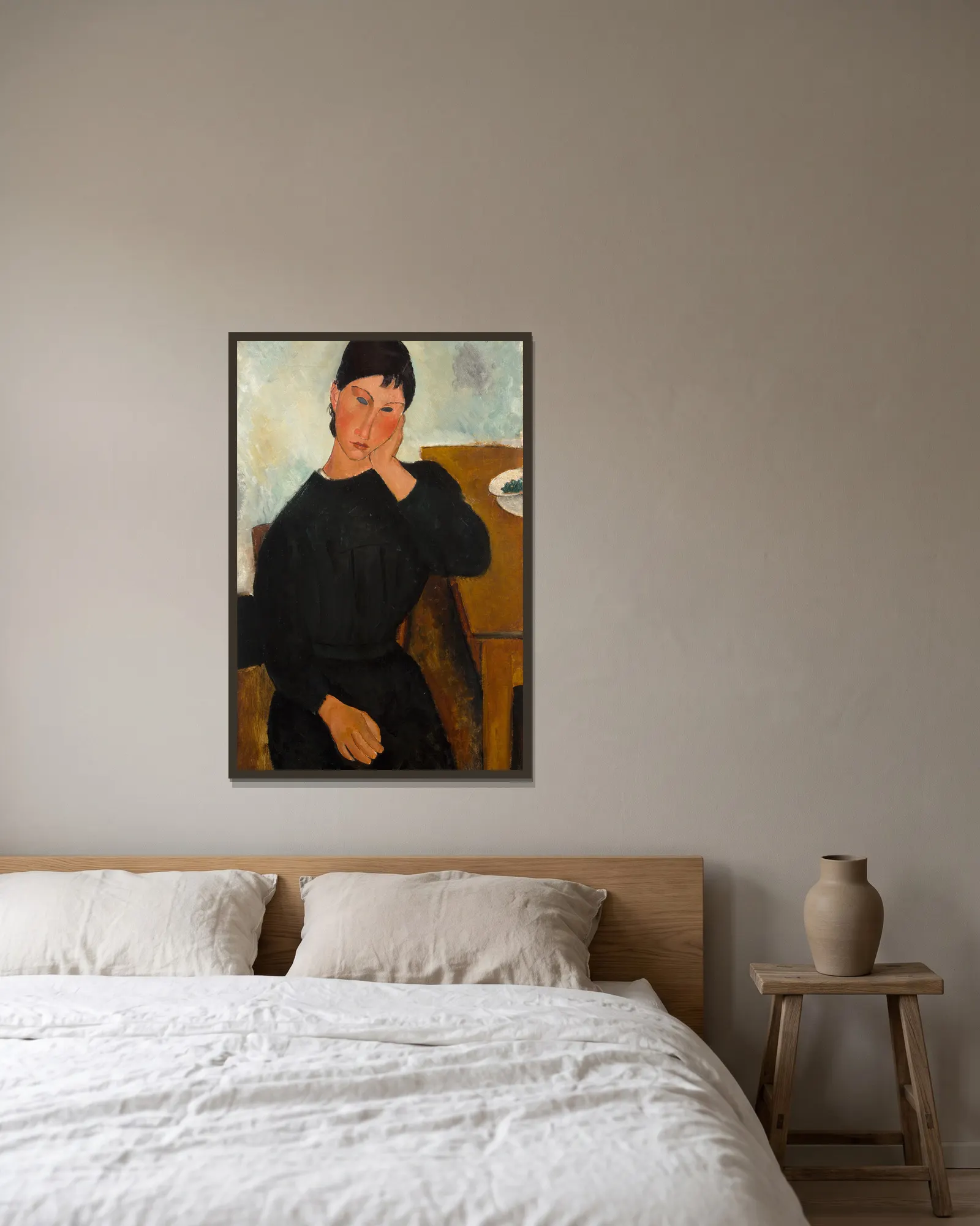 Elvira Resting at a Table av Amedeo Modigliani inramad på en vägg