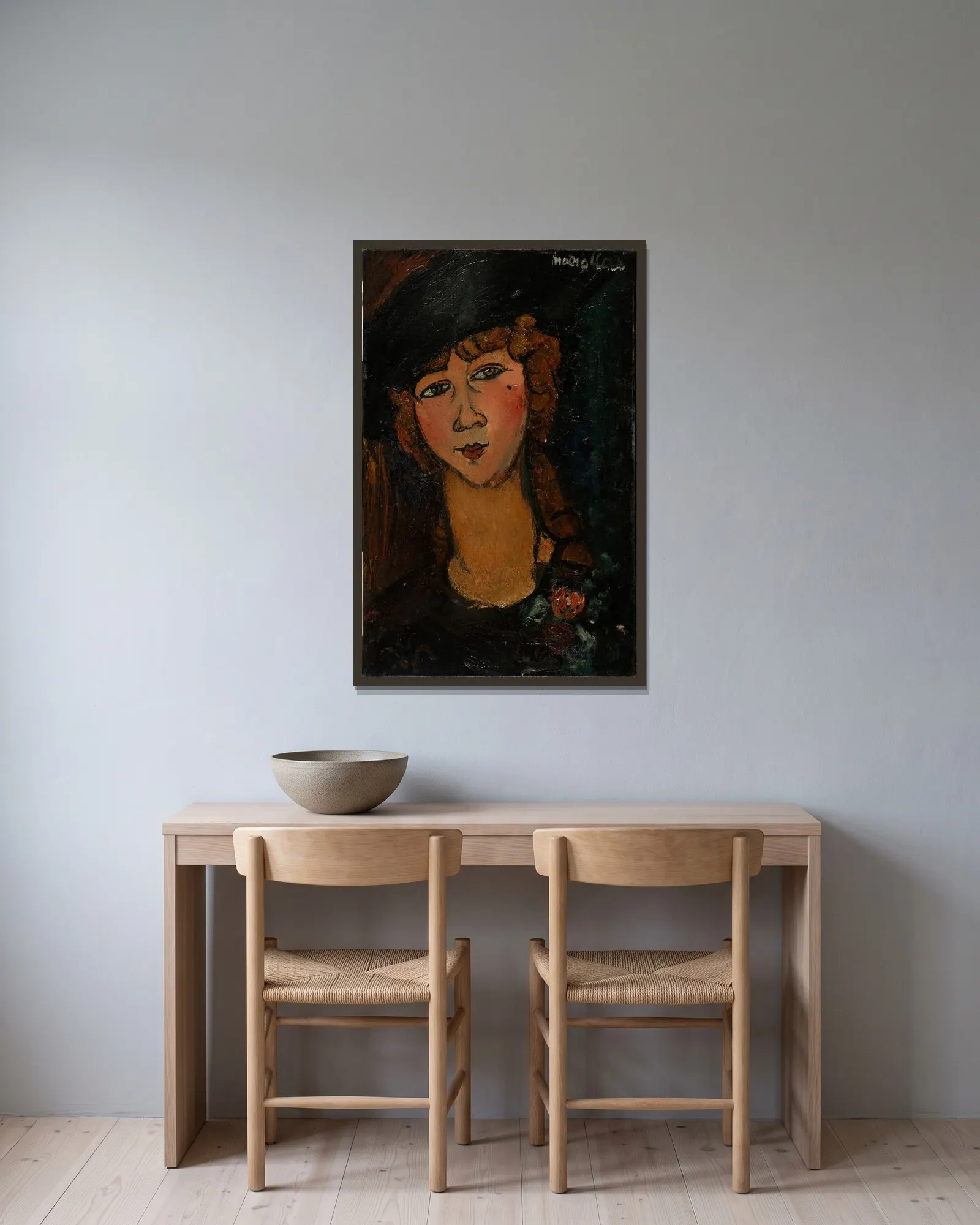 Lolotte av Amedeo Modigliani inramad på en vägg