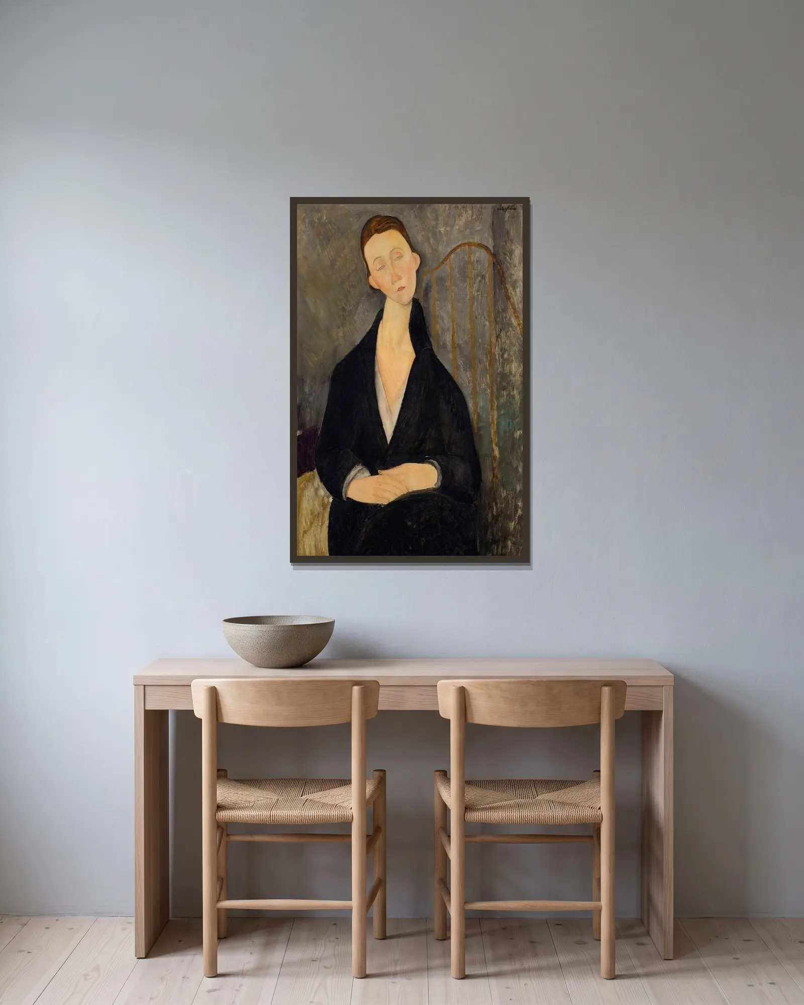 Lunia Czechowska av Amedeo Modigliani inramad på en vägg