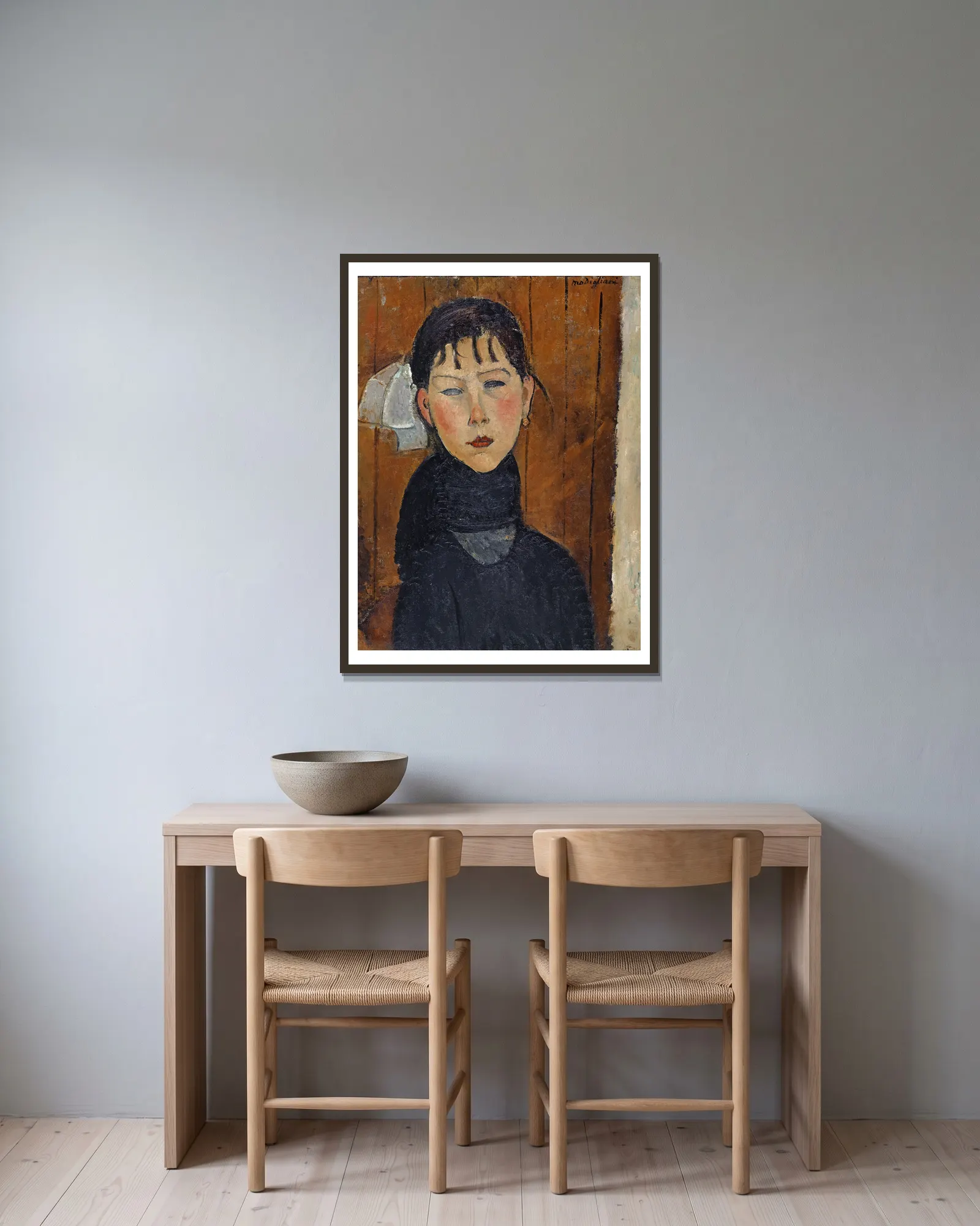 Marie (Marie, Daughter of the People) av Amedeo Modigliani inramad på en vägg