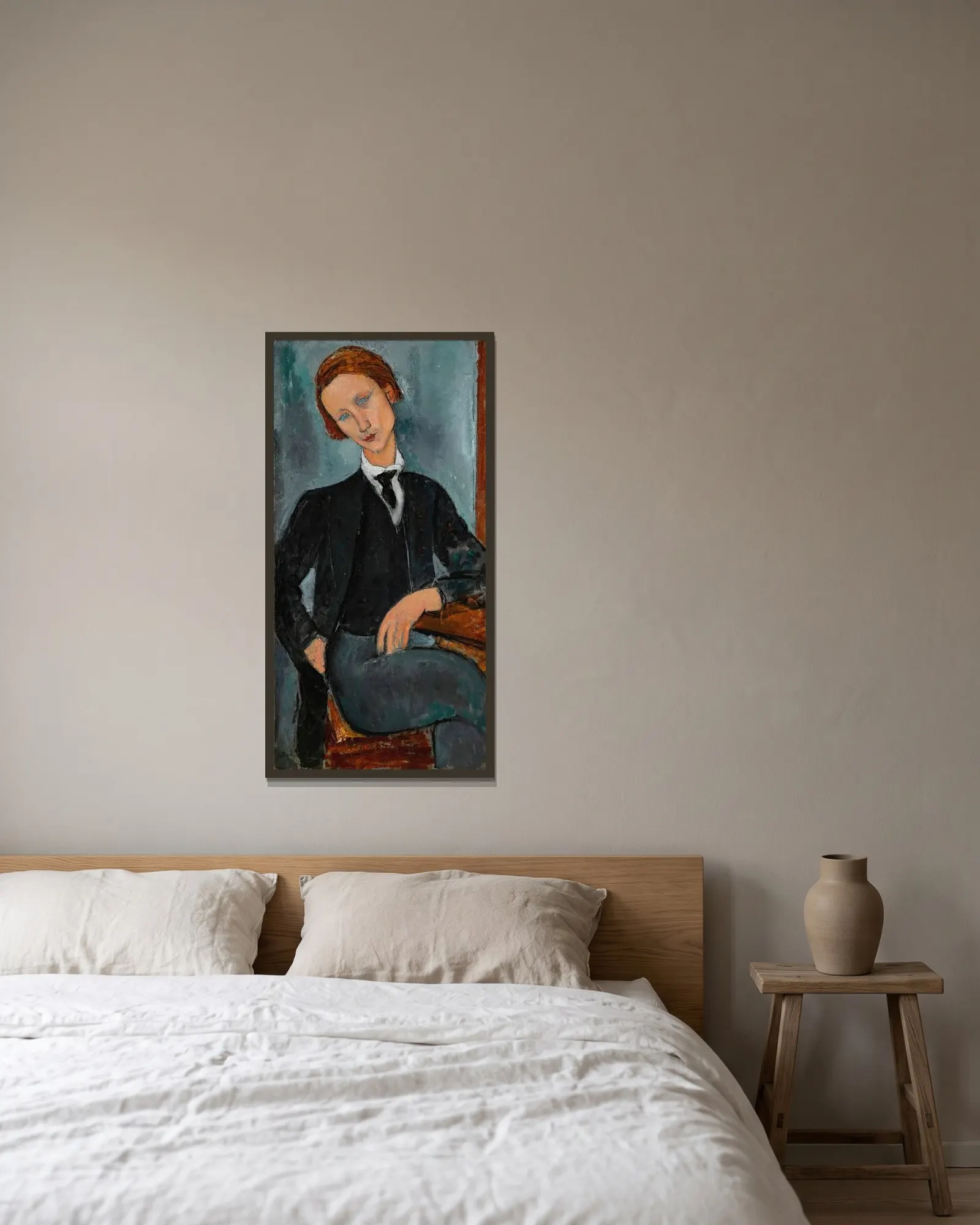 Portrait de Baranowski av Amedeo Modigliani inramad på en vägg