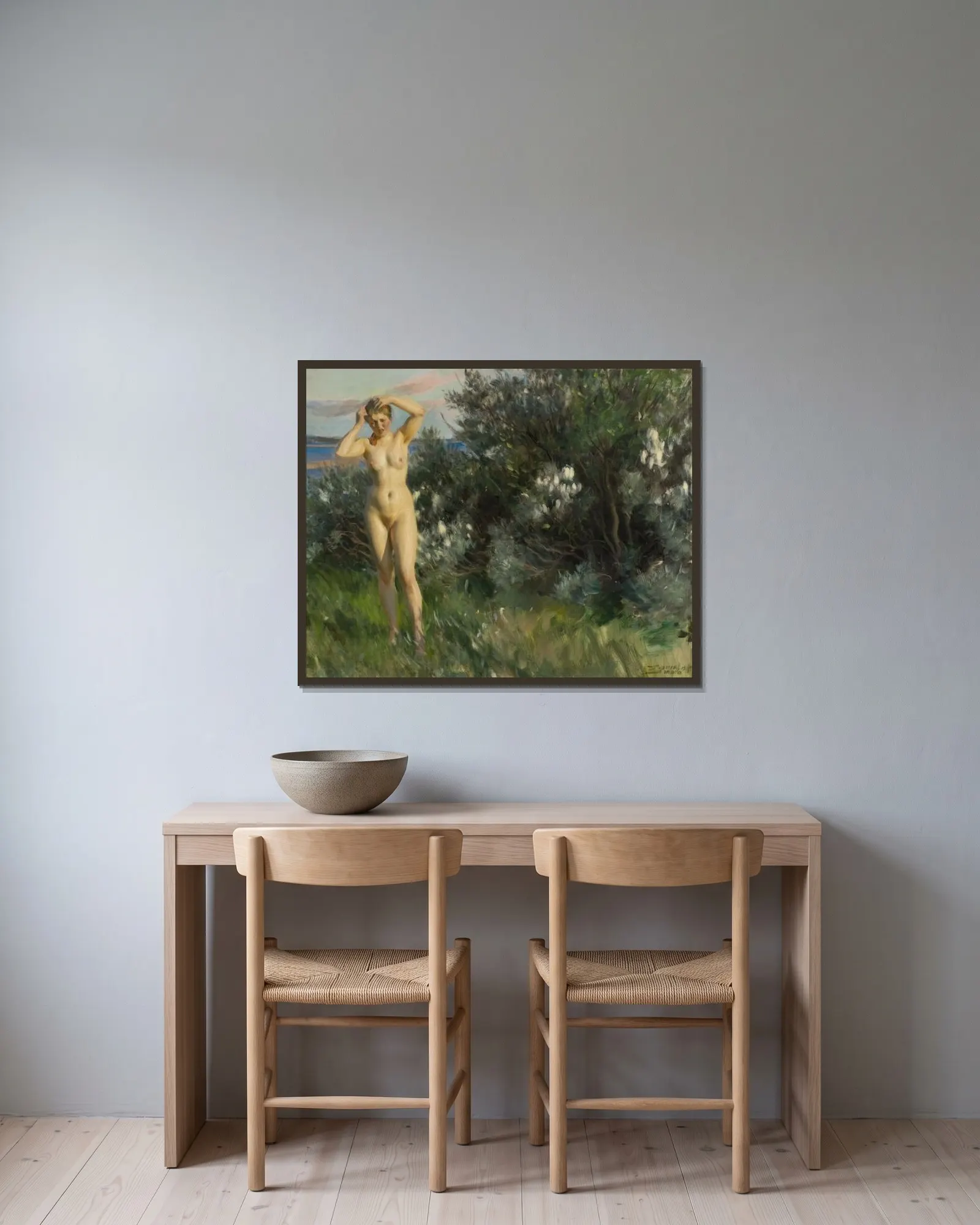 Vid Siljan av Anders Zorn inramad på en vägg