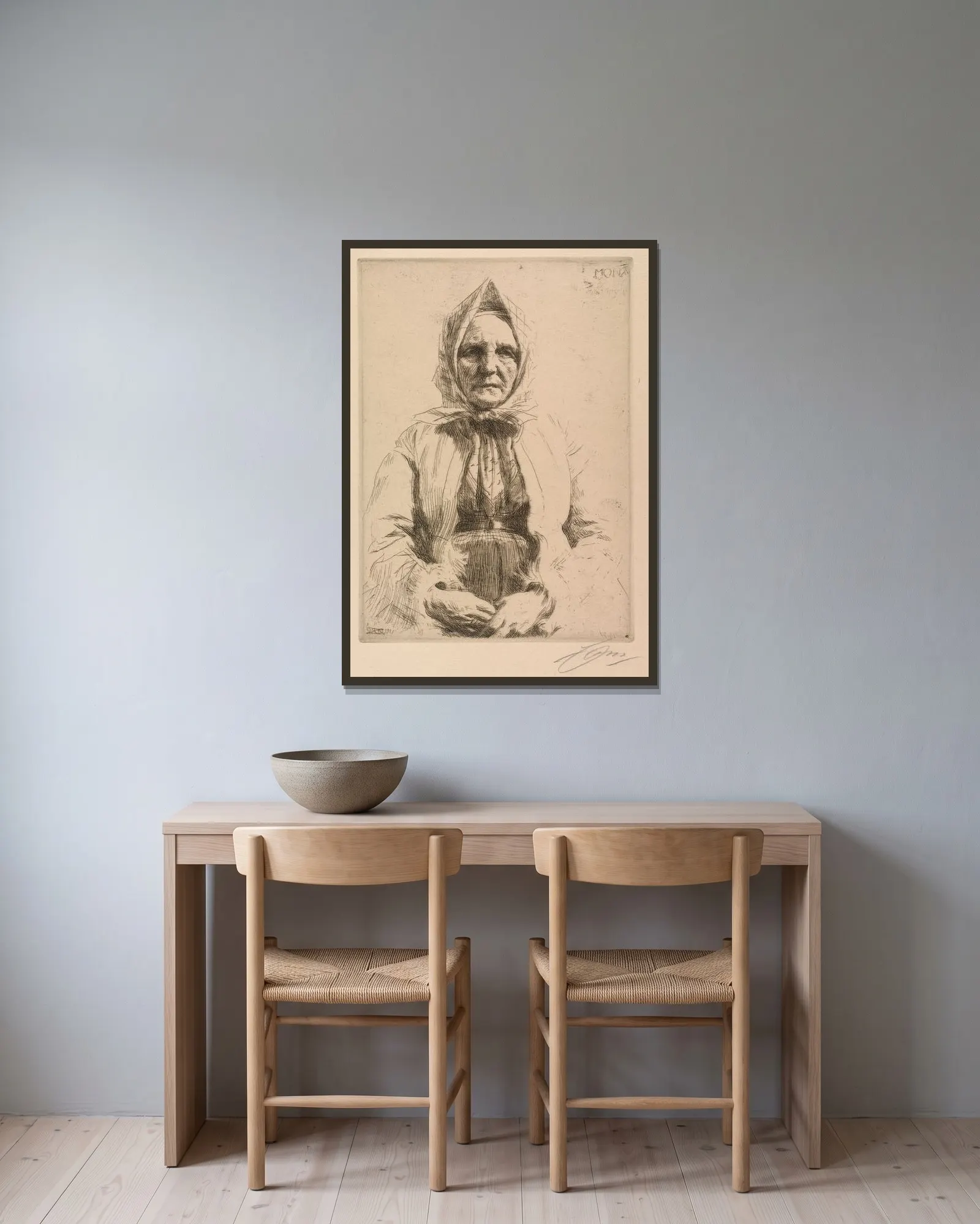 Mona av Anders Zorn inramad på en vägg