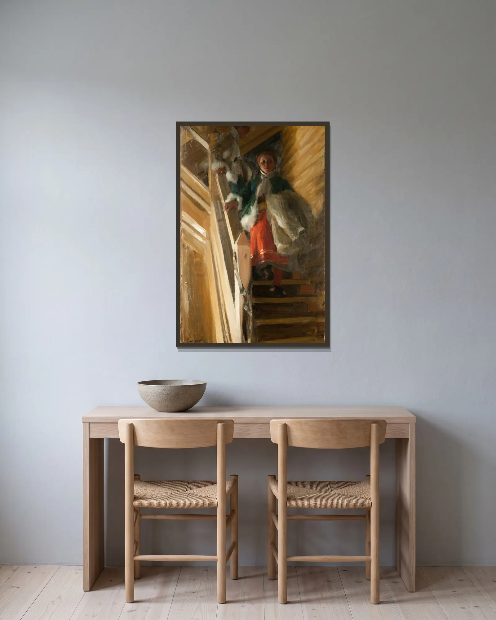 På vindstrappan av Anders Zorn inramad på en vägg