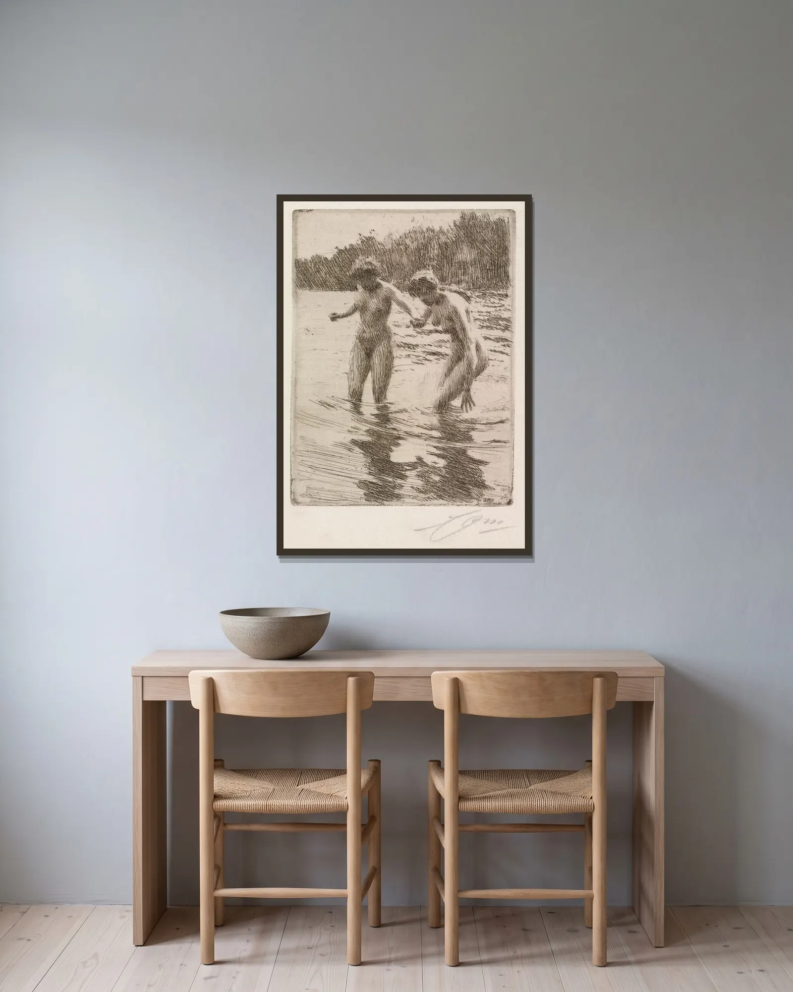 Two Bathers av Anders Zorn inramad på en vägg