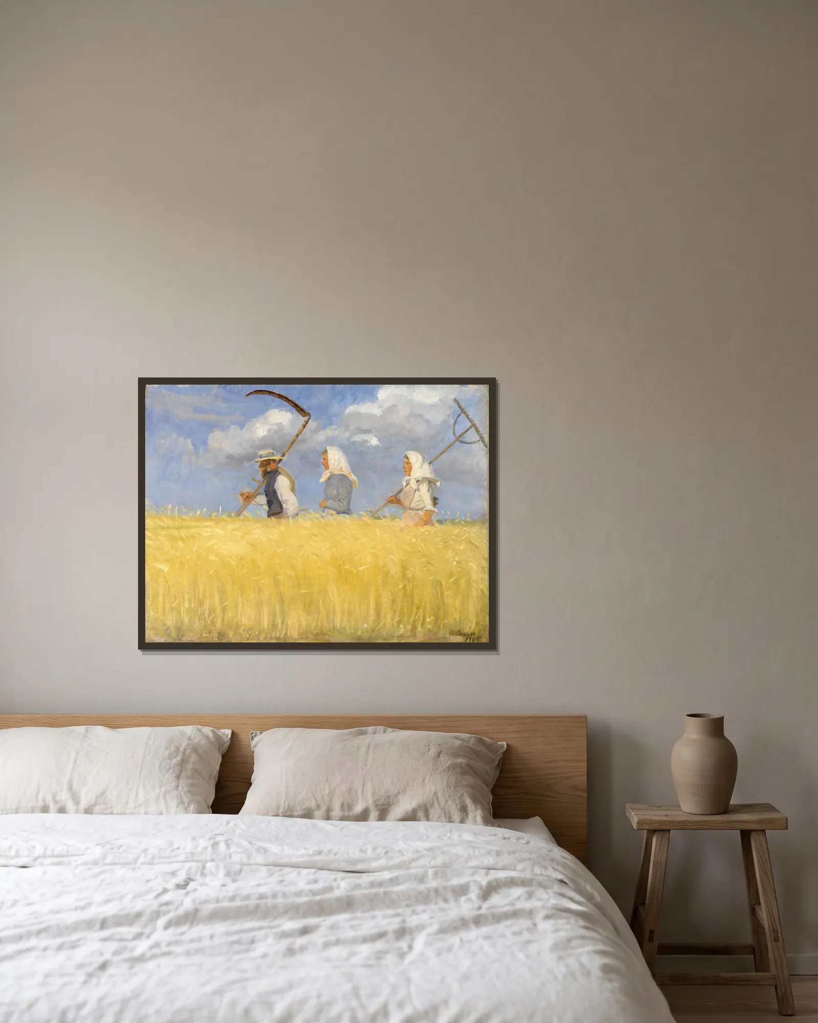 Harvesters av Anna Ancher inramad på en vägg