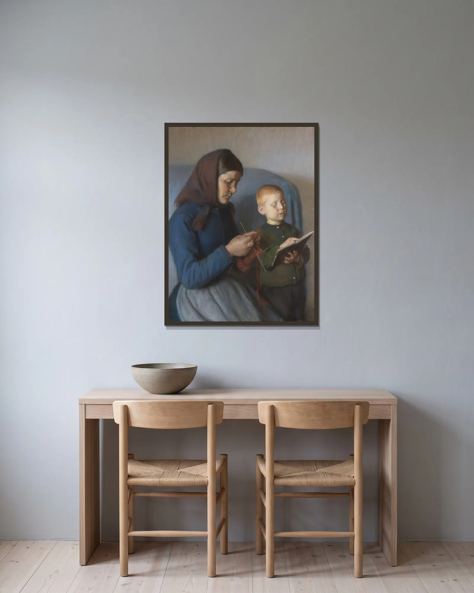 Lektien gennemgåes av Anna Ancher inramad på en vägg