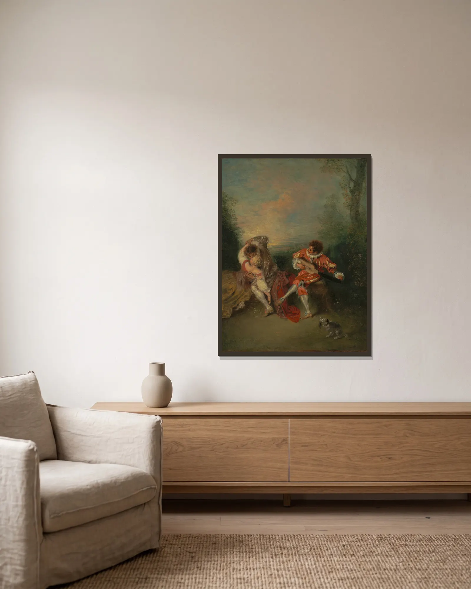 La Surprise av Jean-Antoine Watteau inramad på en vägg
