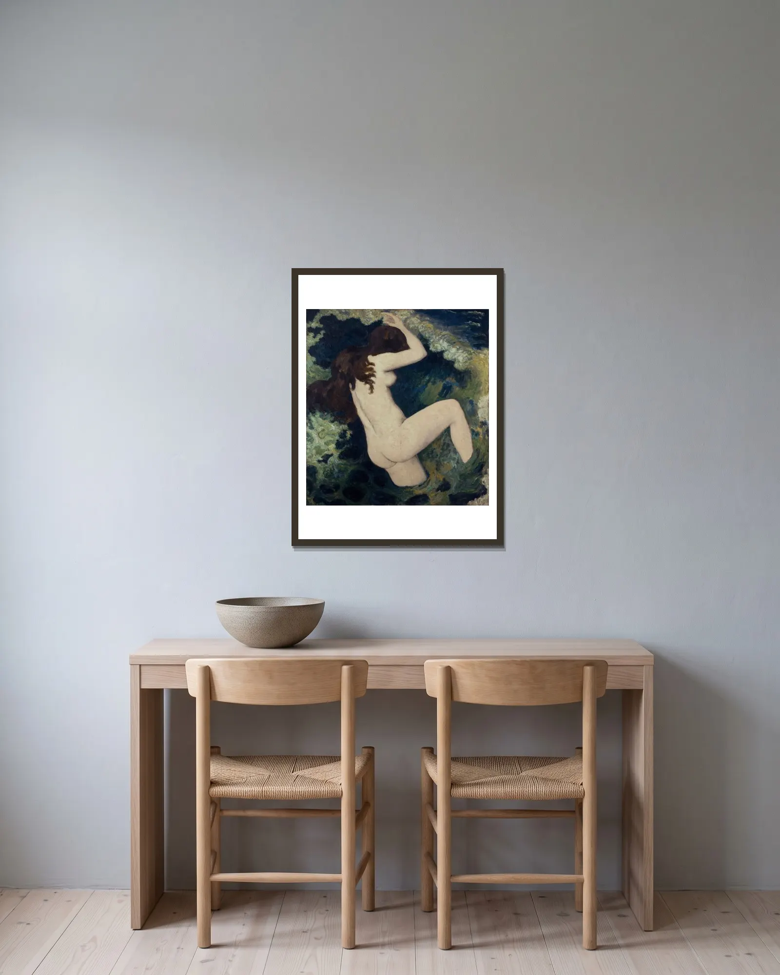 La vague av Aristide Maillol inramad på en vägg