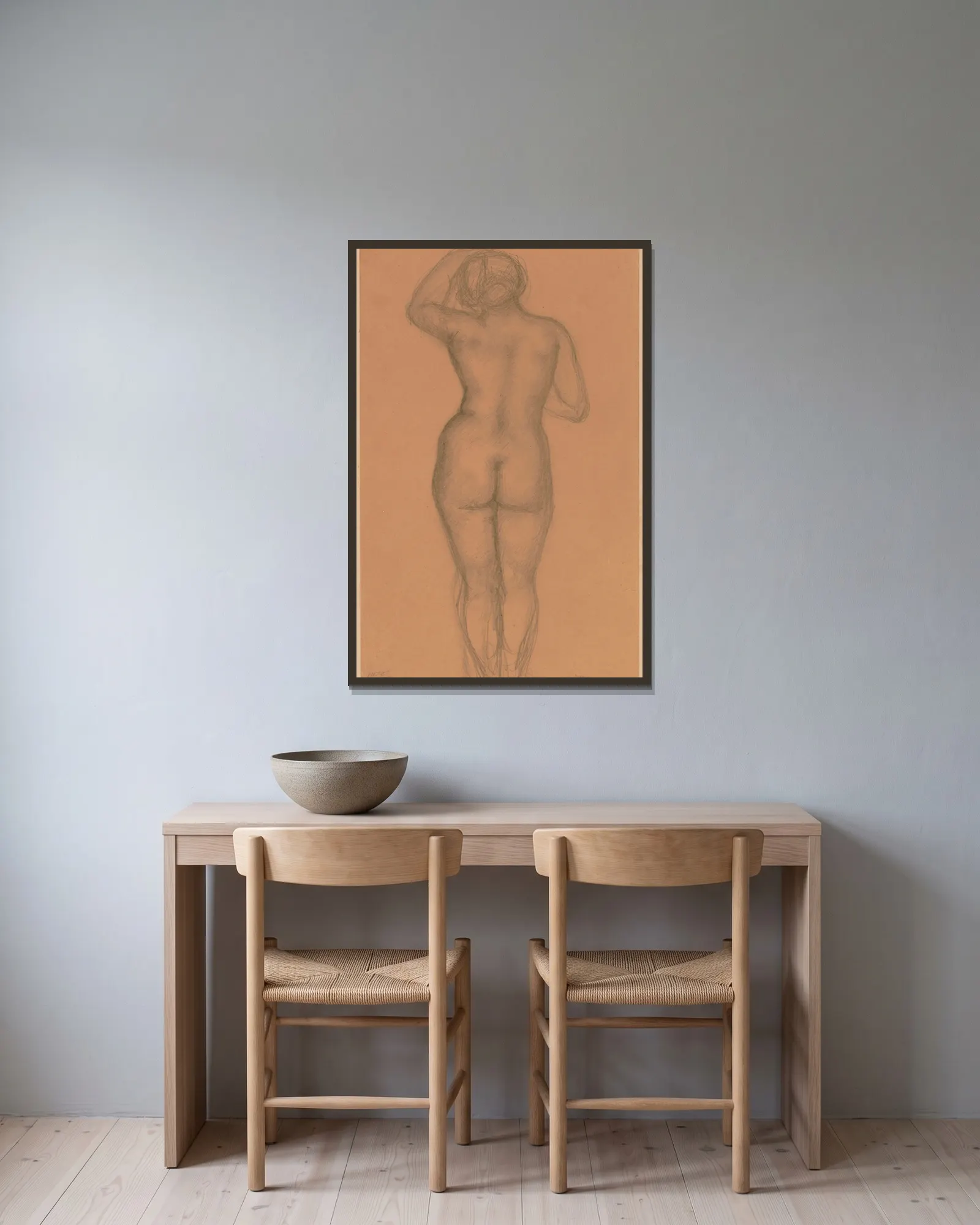 Nude Seen from the Back av Aristide Maillol inramad på en vägg