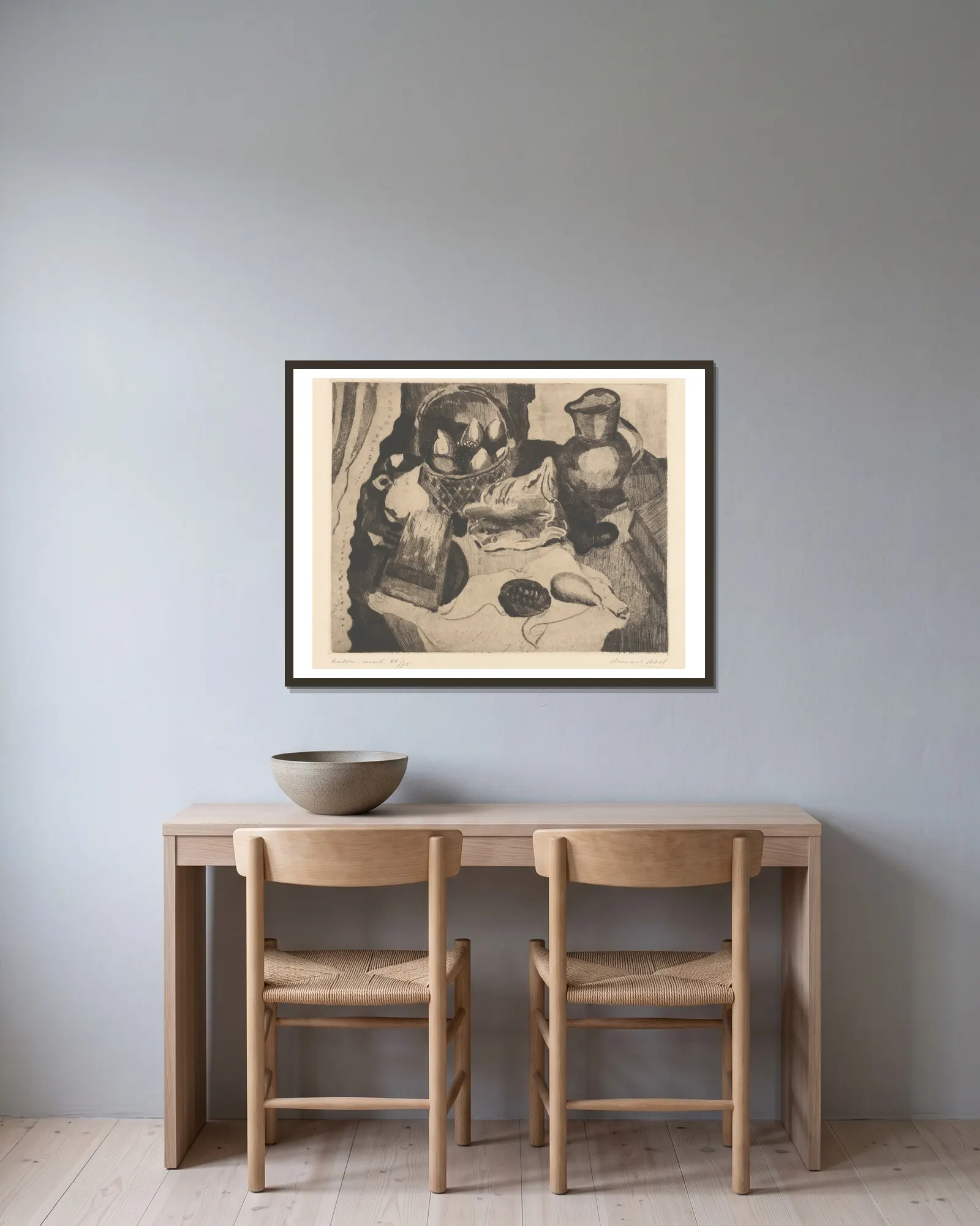 Nature morte av Armand Apol inramad på en vägg