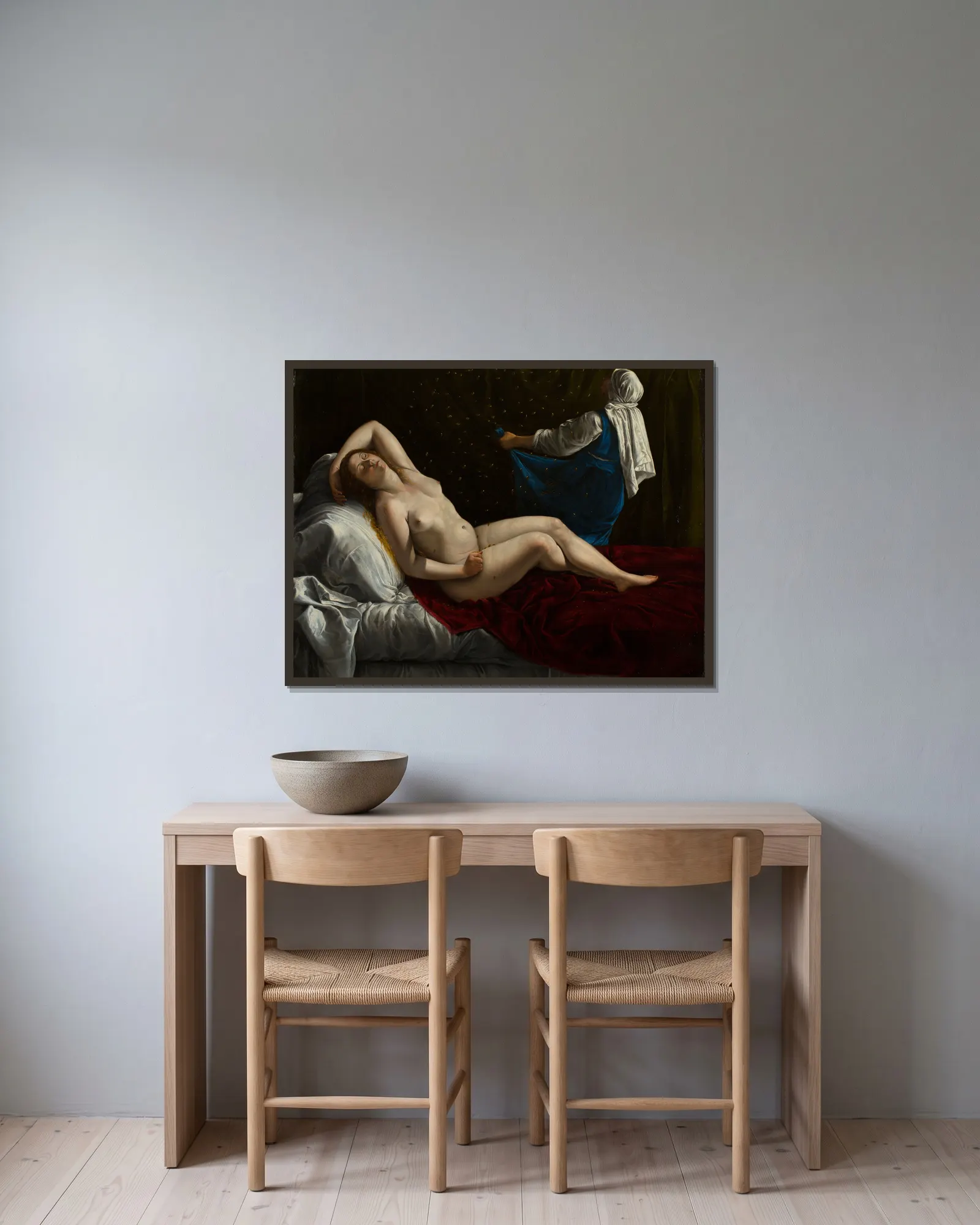 Danaë av Artemisia Gentileschi inramad på en vägg