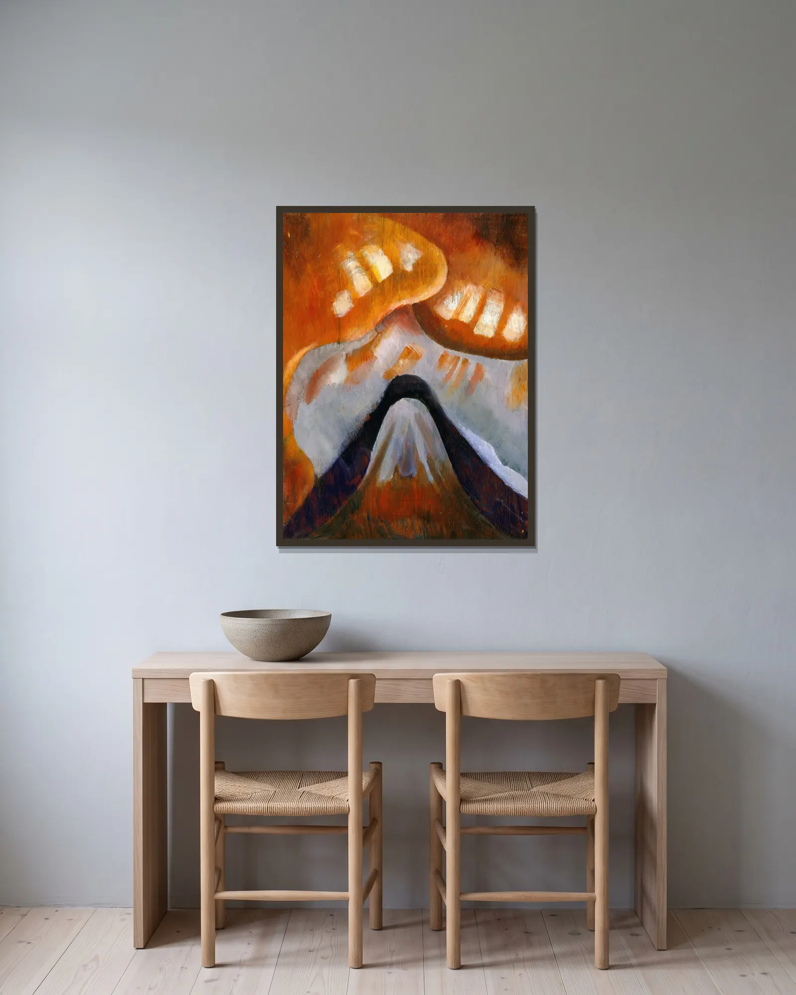 Mountain and Sky av Arthur Dove inramad på en vägg