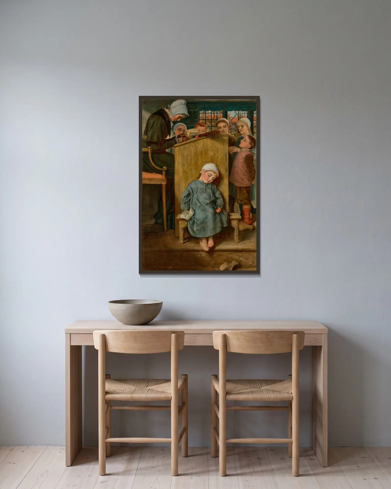 En Pénitence av Arthur Hughes inramad på en vägg
