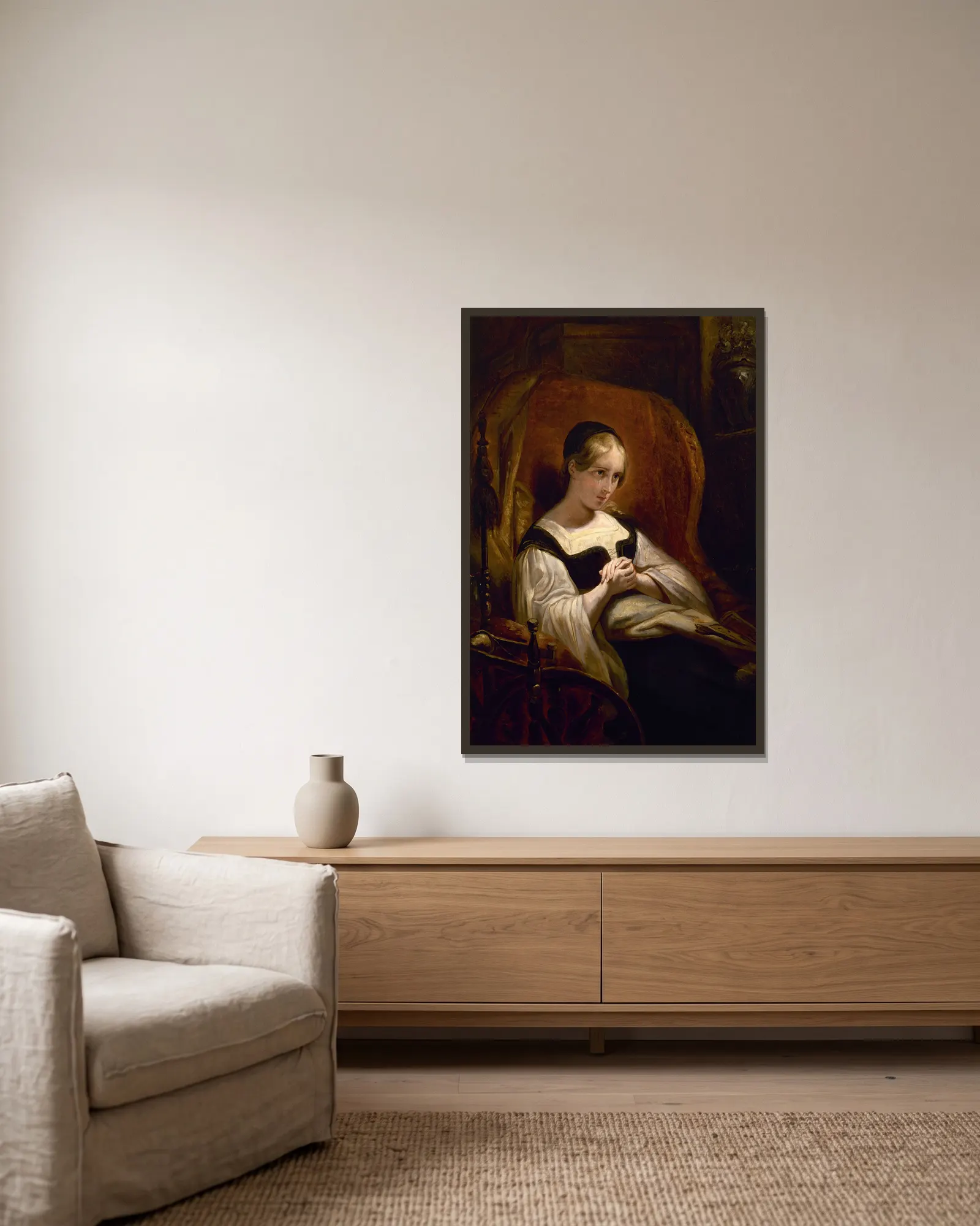 Marguerite au Rouet av Ary Scheffer inramad på en vägg