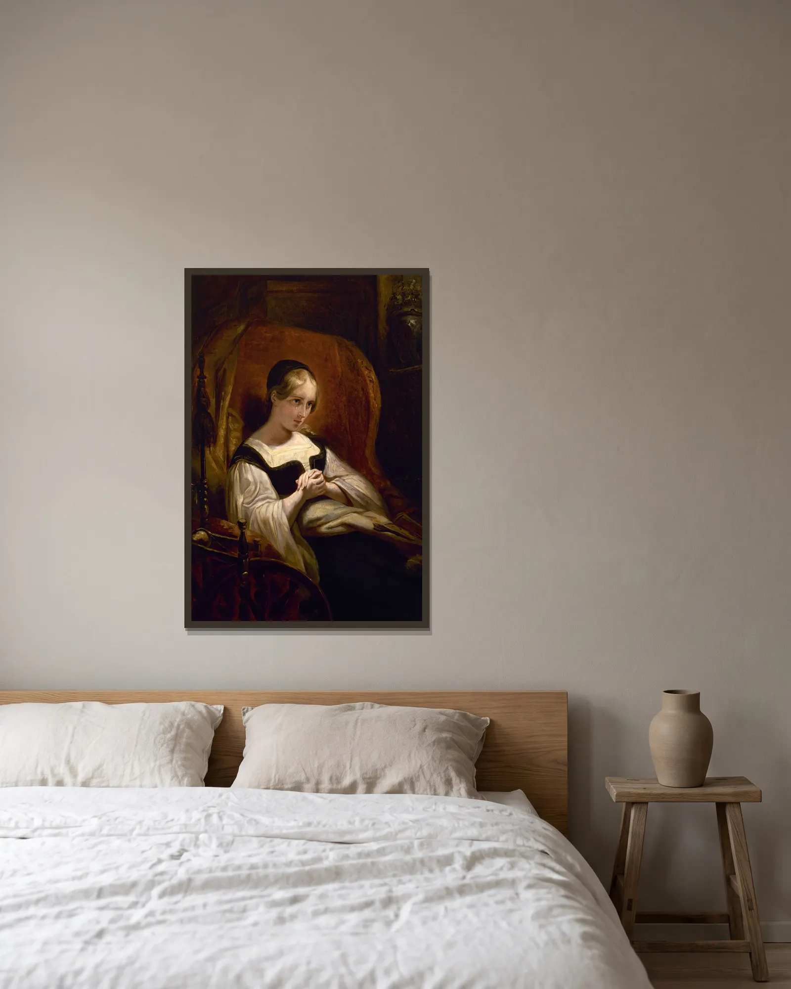 Marguerite au Rouet av Ary Scheffer inramad på en vägg