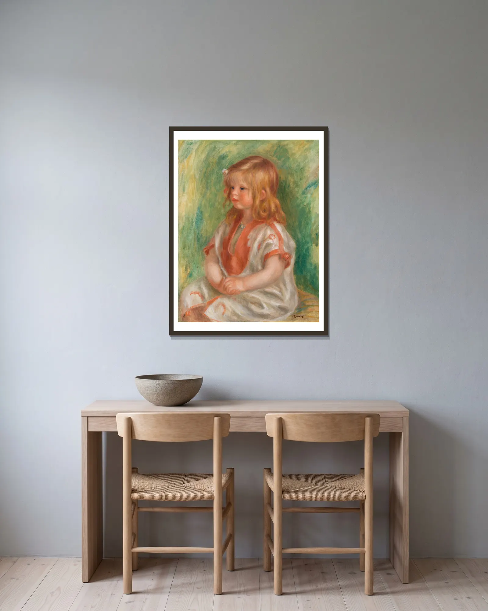 Claude Renoir av Pierre-Auguste Renoir inramad på en vägg