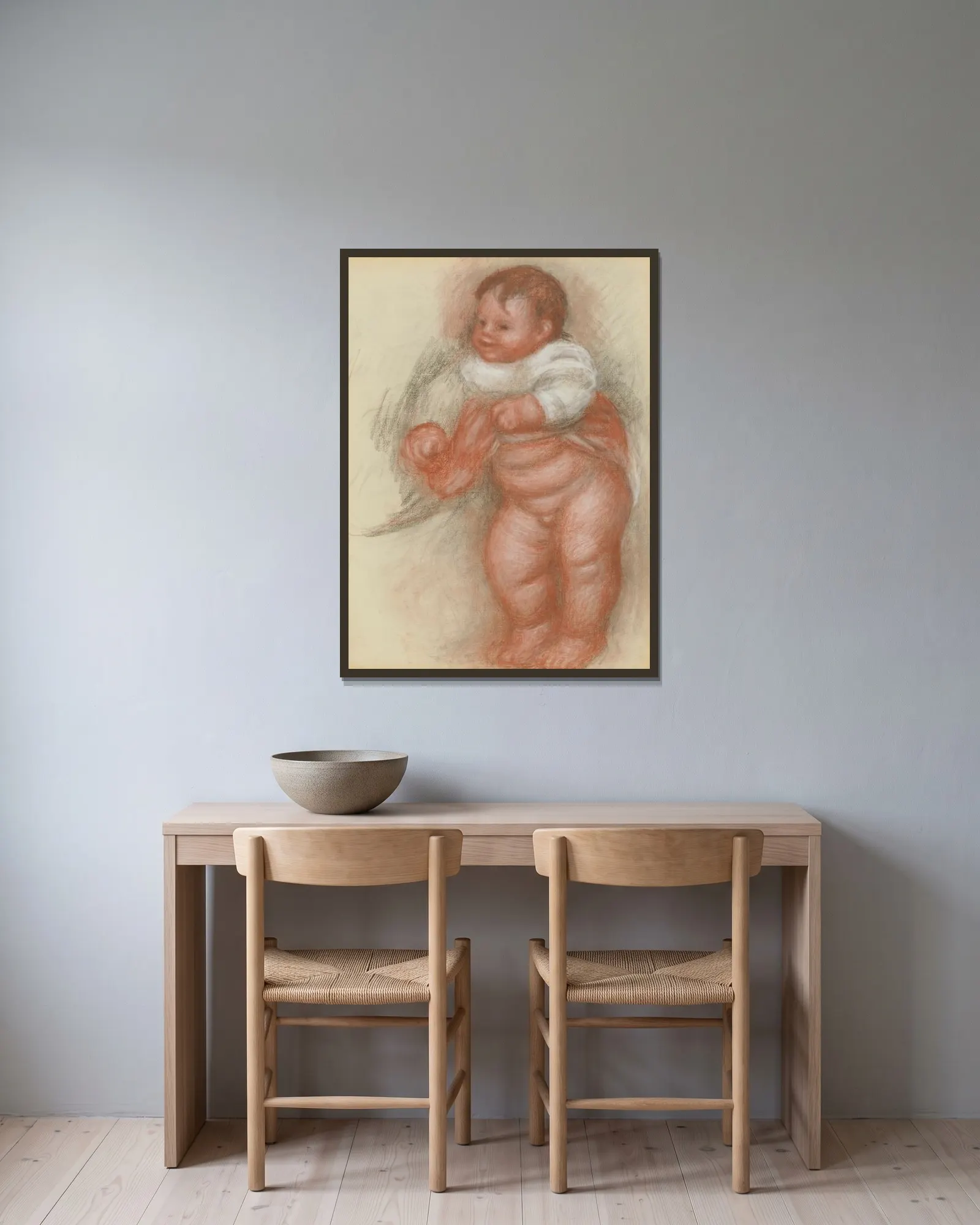 Enfant Nu Debout av Pierre-Auguste Renoir inramad på en vägg