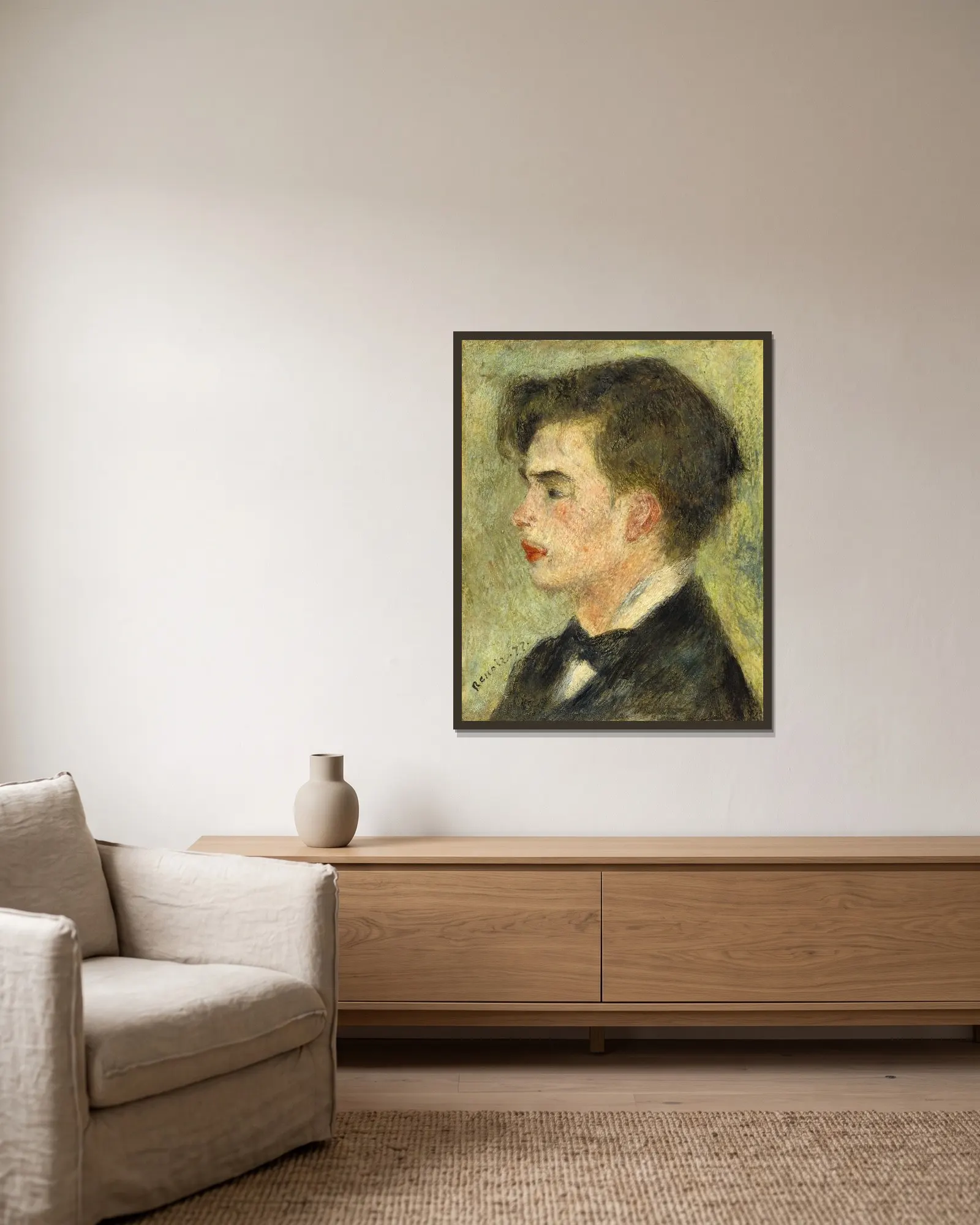 Georges Rivière av Pierre-Auguste Renoir inramad på en vägg