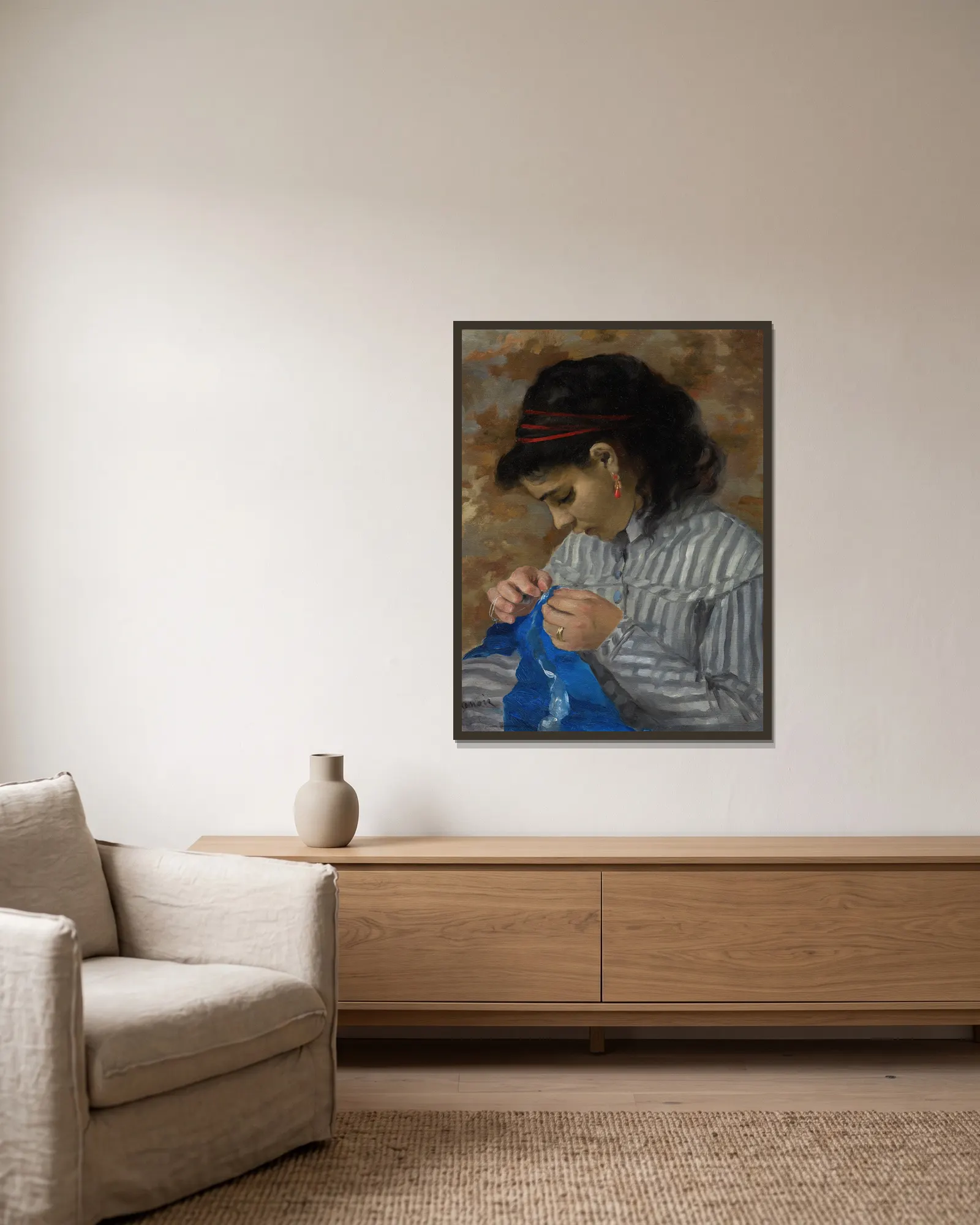 Lise Sewing av Pierre-Auguste Renoir inramad på en vägg