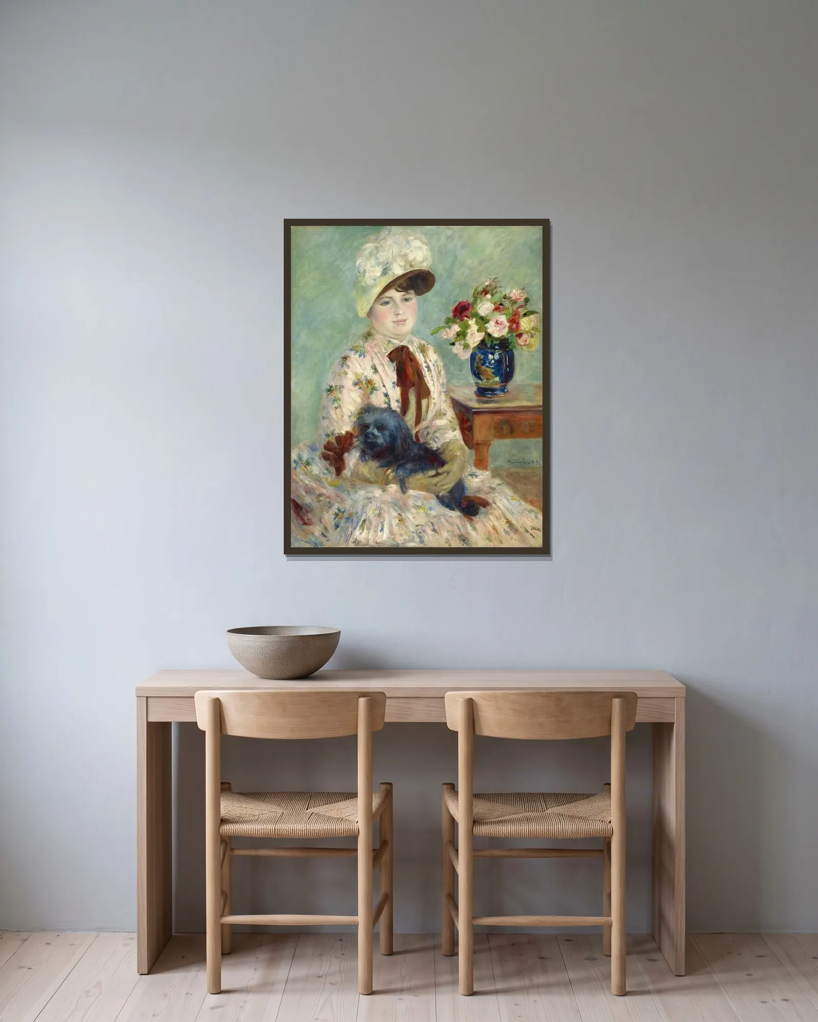Mlle Charlotte Berthier av Pierre-Auguste Renoir inramad på en vägg