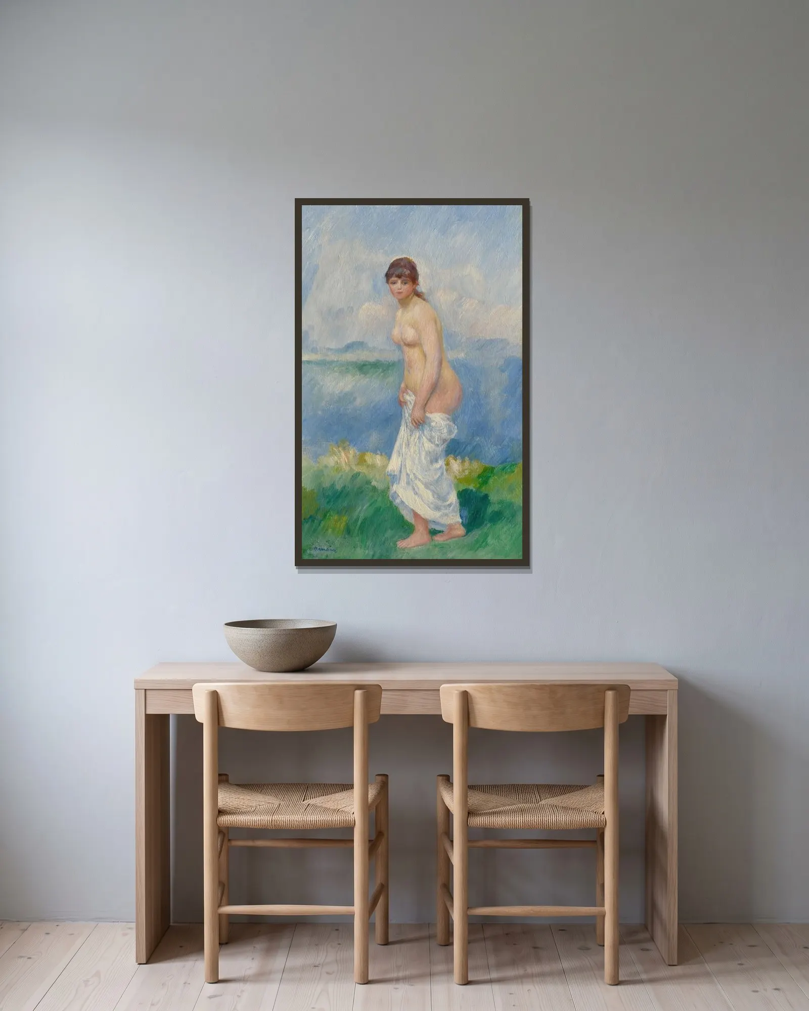 Standing Bather av Pierre-Auguste Renoir inramad på en vägg