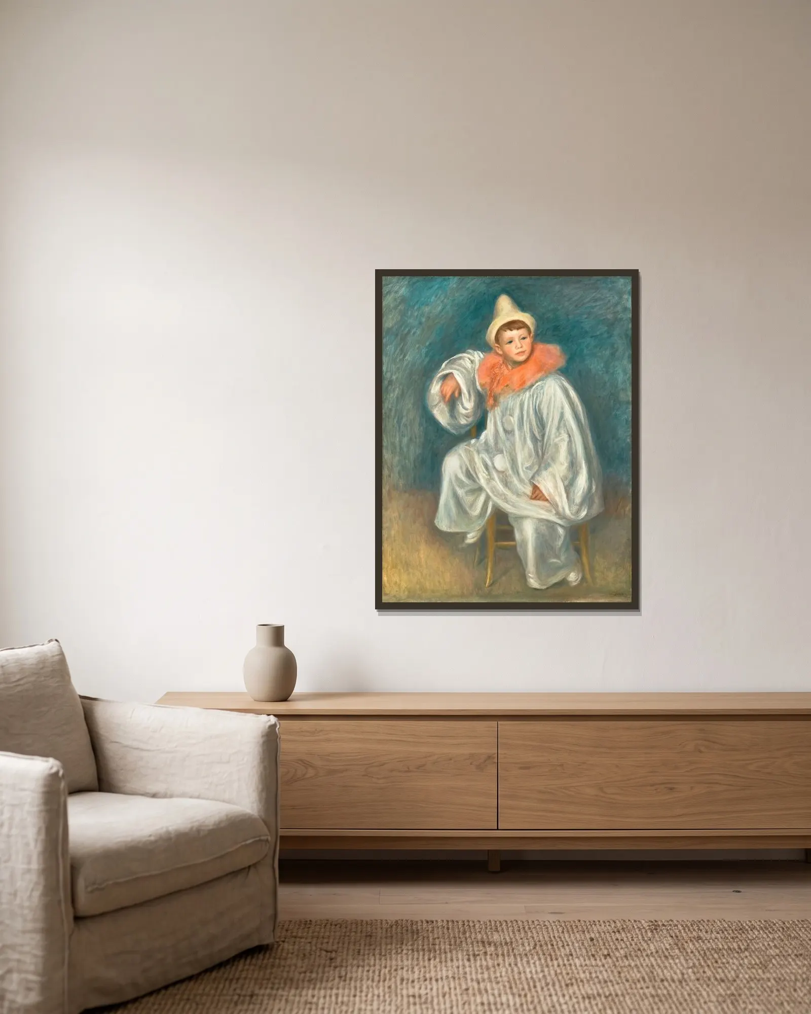 The White Pierrot av Pierre-Auguste Renoir inramad på en vägg